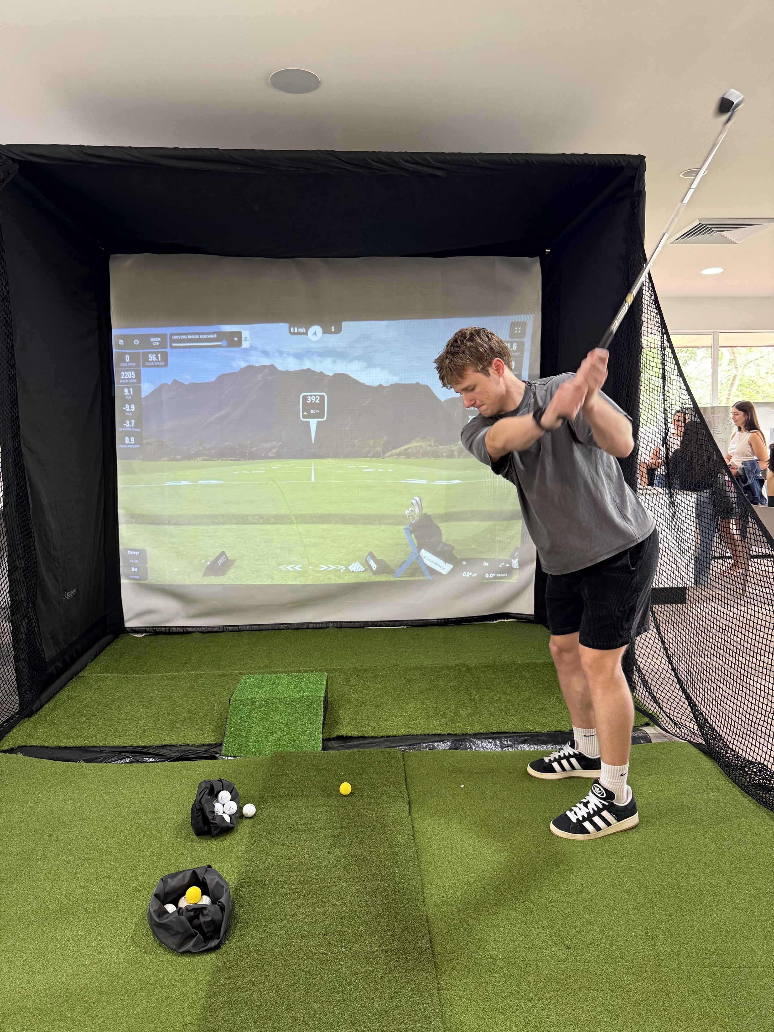 A Mobile golf simulator set up at an indoor facility in Sydney