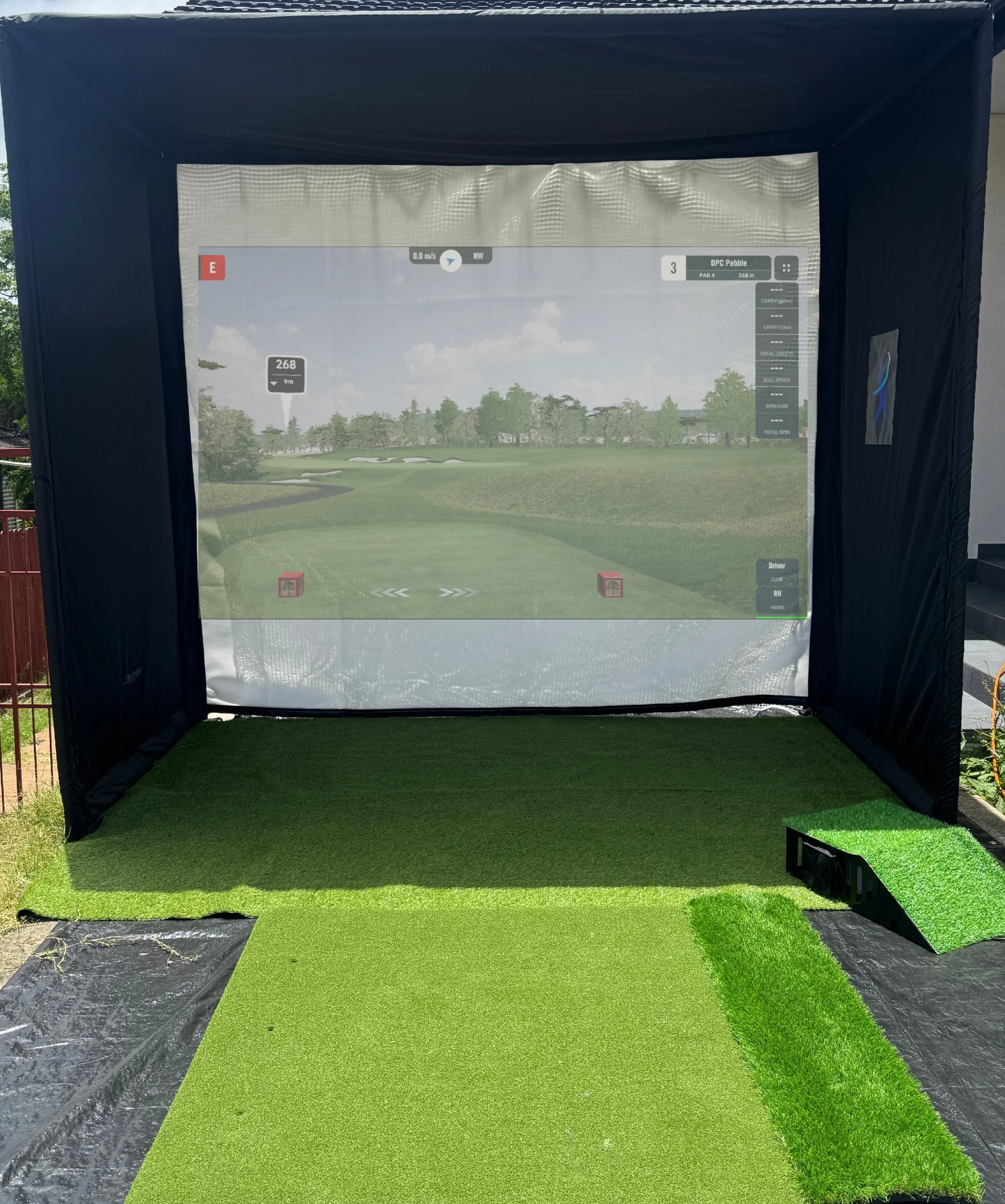 Mobile Golf Simulator displaying the 3rd hole of pebble beach golf course.