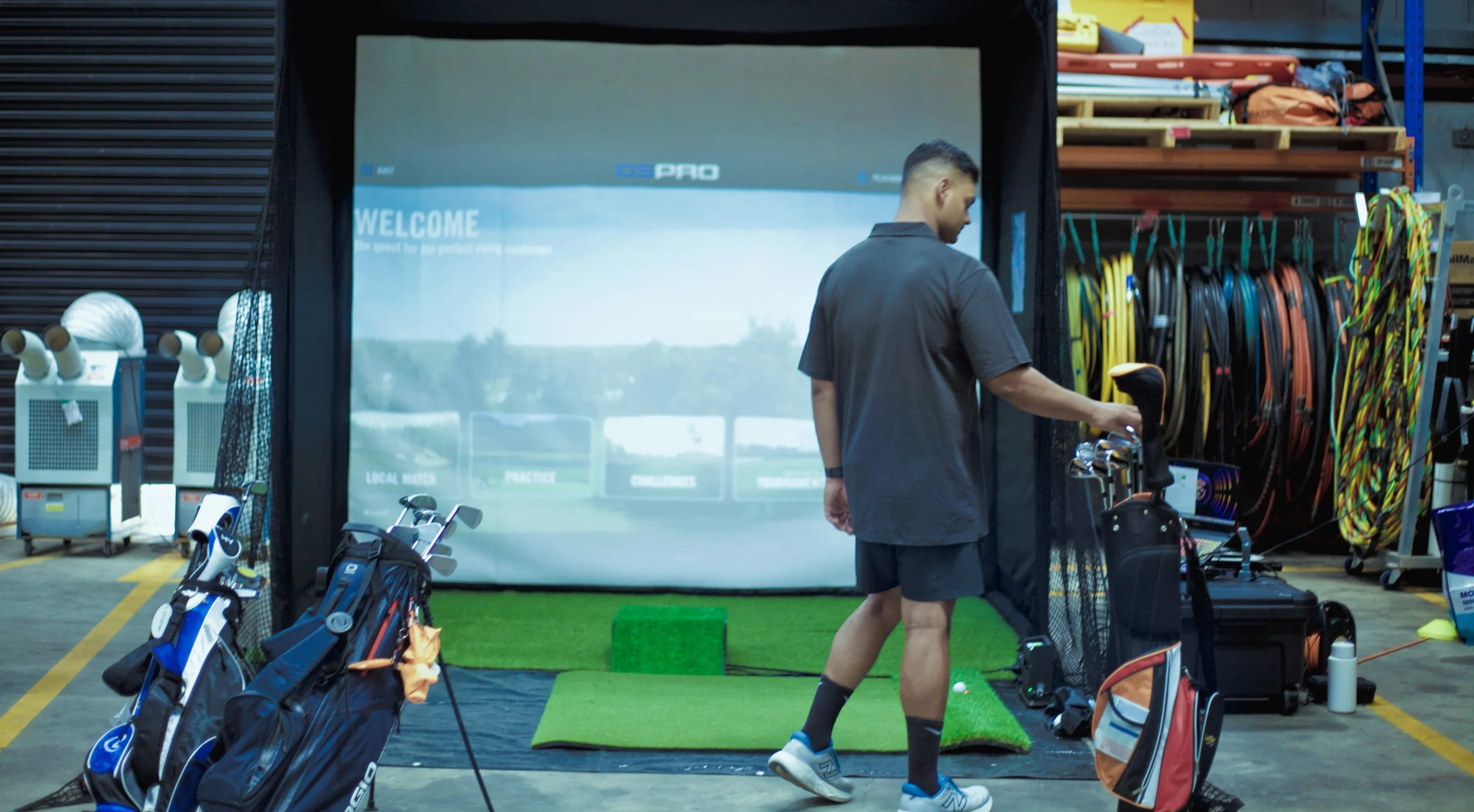 The Pop Up Golf hitting enclosure in an outdoor setting