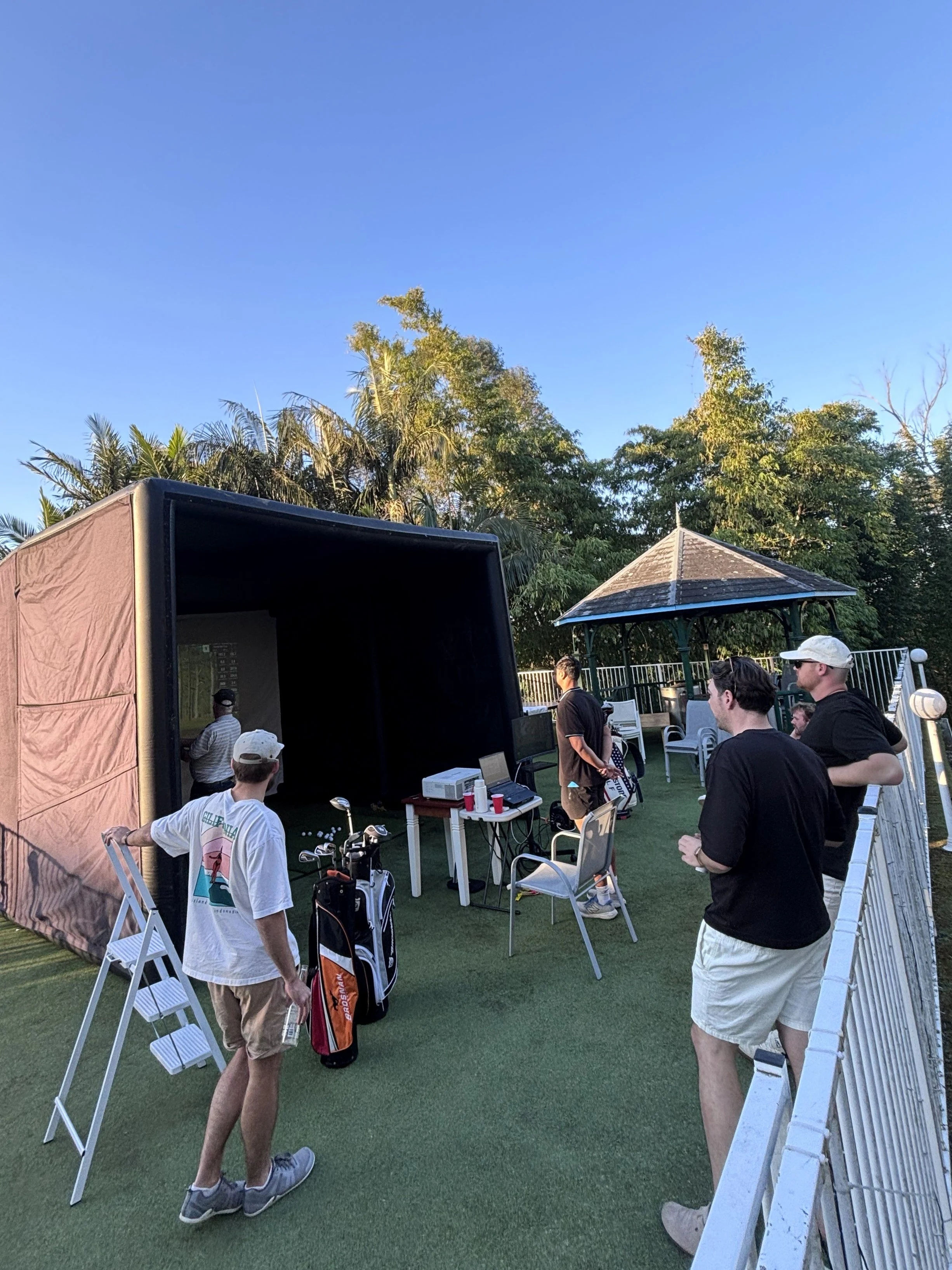 The Pop Up Golf hitting enclosure in an outdoor setting