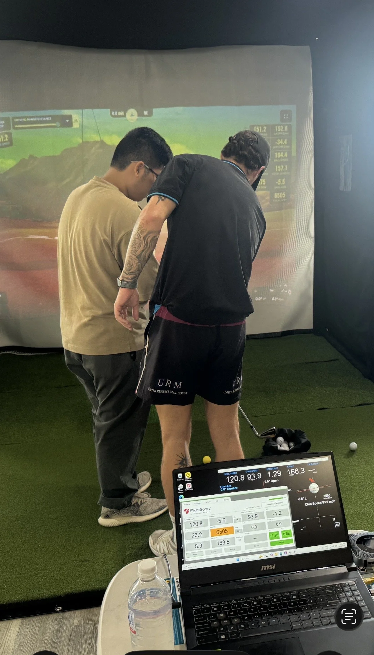 GSPro running on a Windows laptop with the launch monitor connector active to send shot data via GSPro Open Connect.