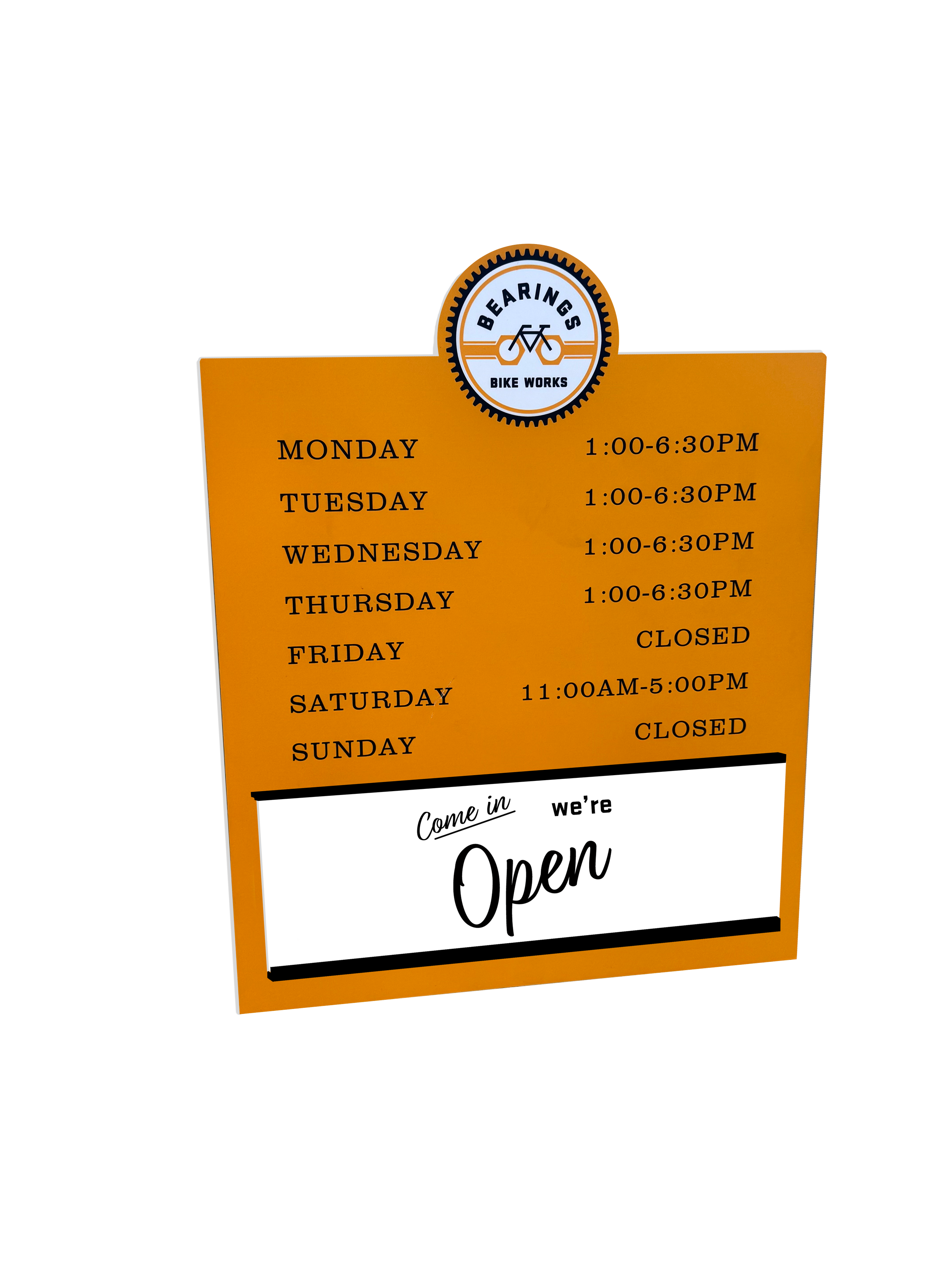 Signboard for Bearings Bike Works listing business hours: Monday to Thursday 1:00 pm to 6:30 pm, Friday closed, Saturday 11:00 am to 5:00 pm, Sunday closed, with an emblem logo at the top featuring a bicycle and the text 'Bearings Bike Works.'