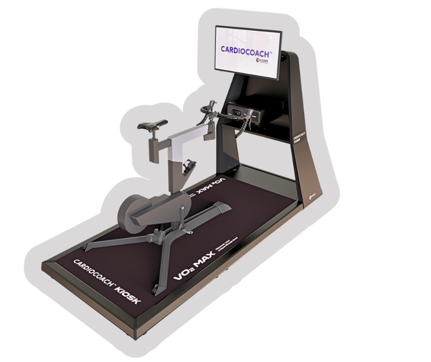 A medical exercise bike with a screen displaying 'CARDIOCOACH,' a seat, handlebars, and a monitor, placed on a black mat with white text.