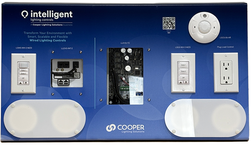 Electrical control panel with switches, outlets, and a Wi-Fi control hub, branded with ''Intelligent lighting controls'' and ''Cooper Lighting Solutions''.