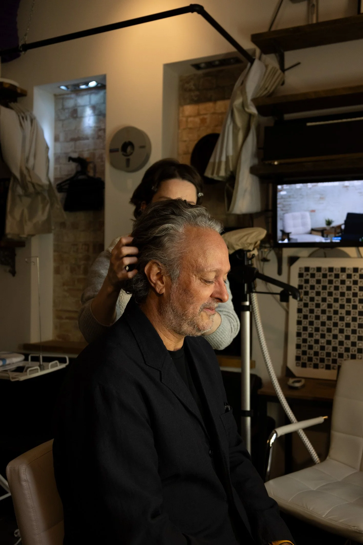 Speaker Terence Mauri in makeup preparation for volumetric capture session at AdventuryXR studio for immersive presentation content