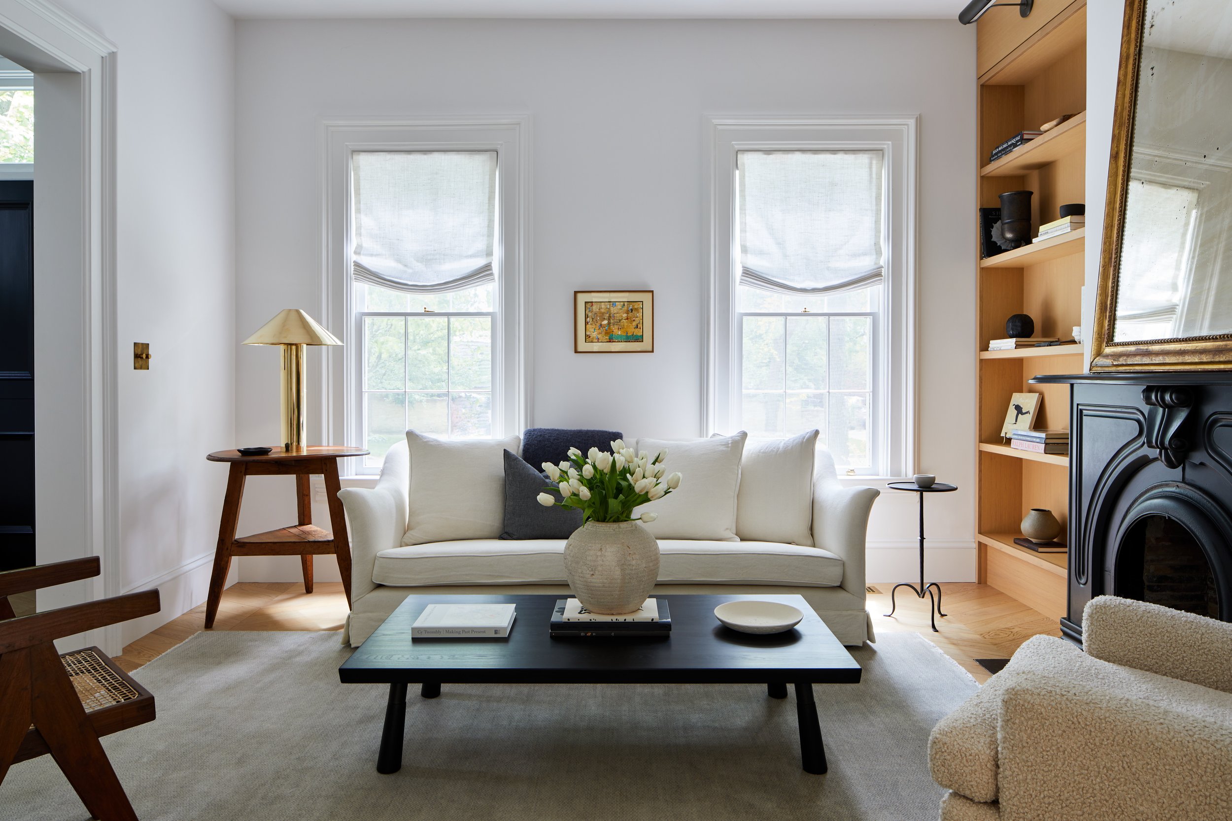 Light Filled Living Room with Built ins and White Sofa