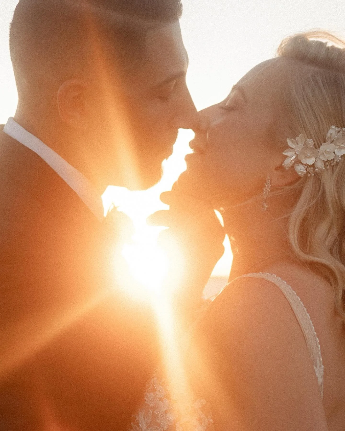 97% of the time when I'm documenting a wedding/elopement, it's a pure candid moment. The only setting up for a shot that I will do is place the getting ready details in the area I want them to get ready in, but the rest of it is unplanned and I just 