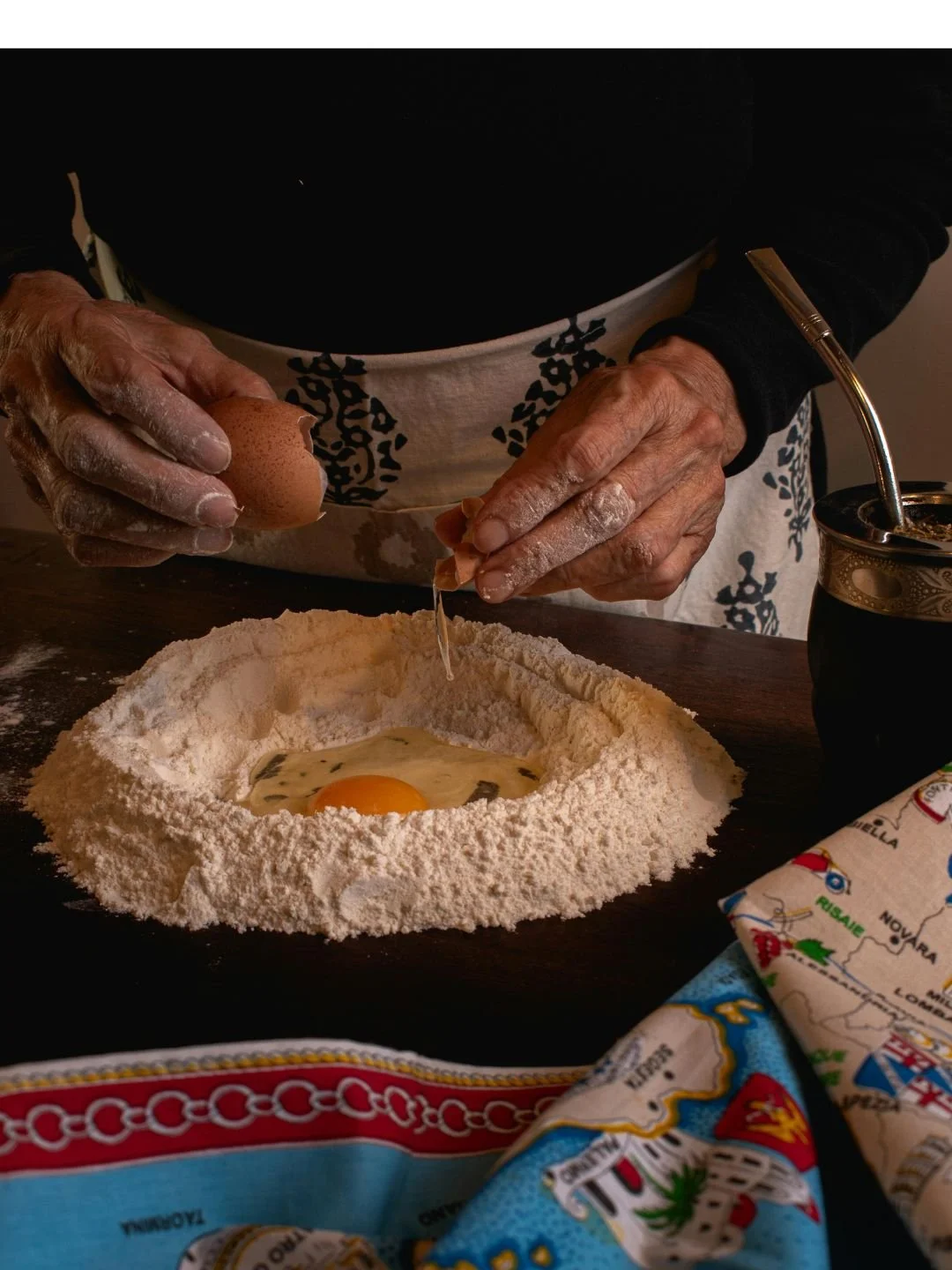 Flour well with egg in the center to make homemade pasta 