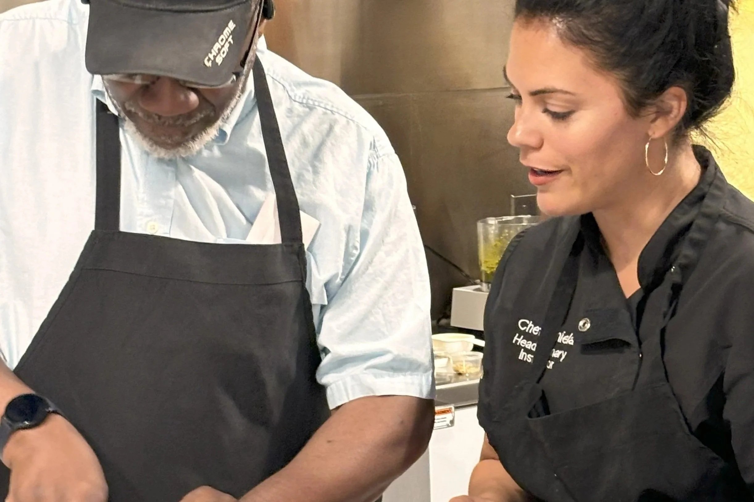 Kalota Culinary chefs teaching hands-on cooking techniques during a Metro Detroit class