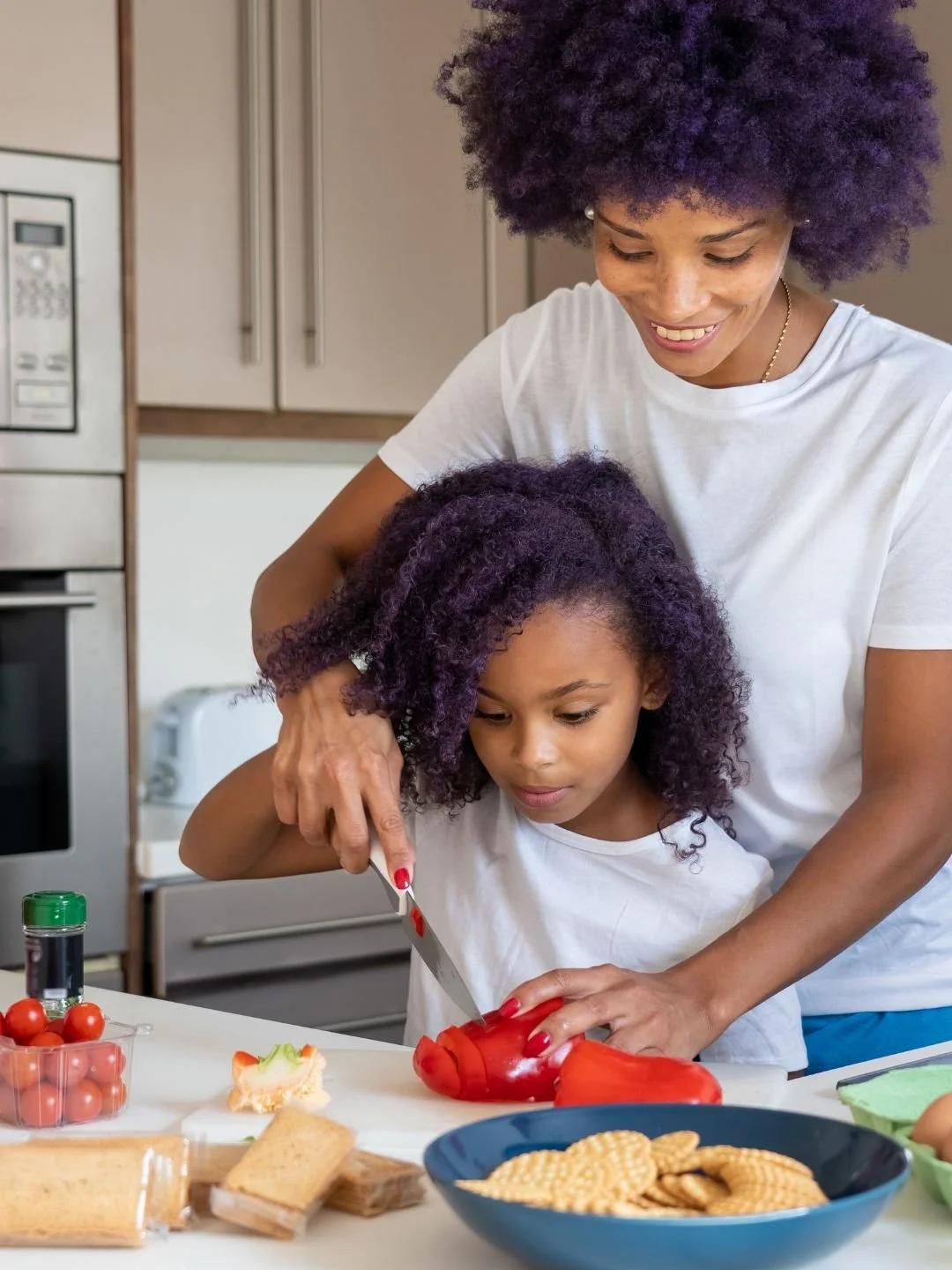 Mom and Child cooking and enjoying Mothers Day 