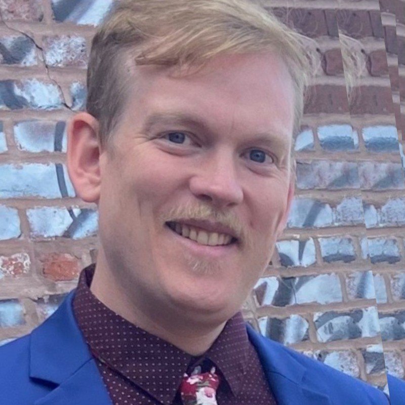 Photo of Man with Moustache and Short Hair .