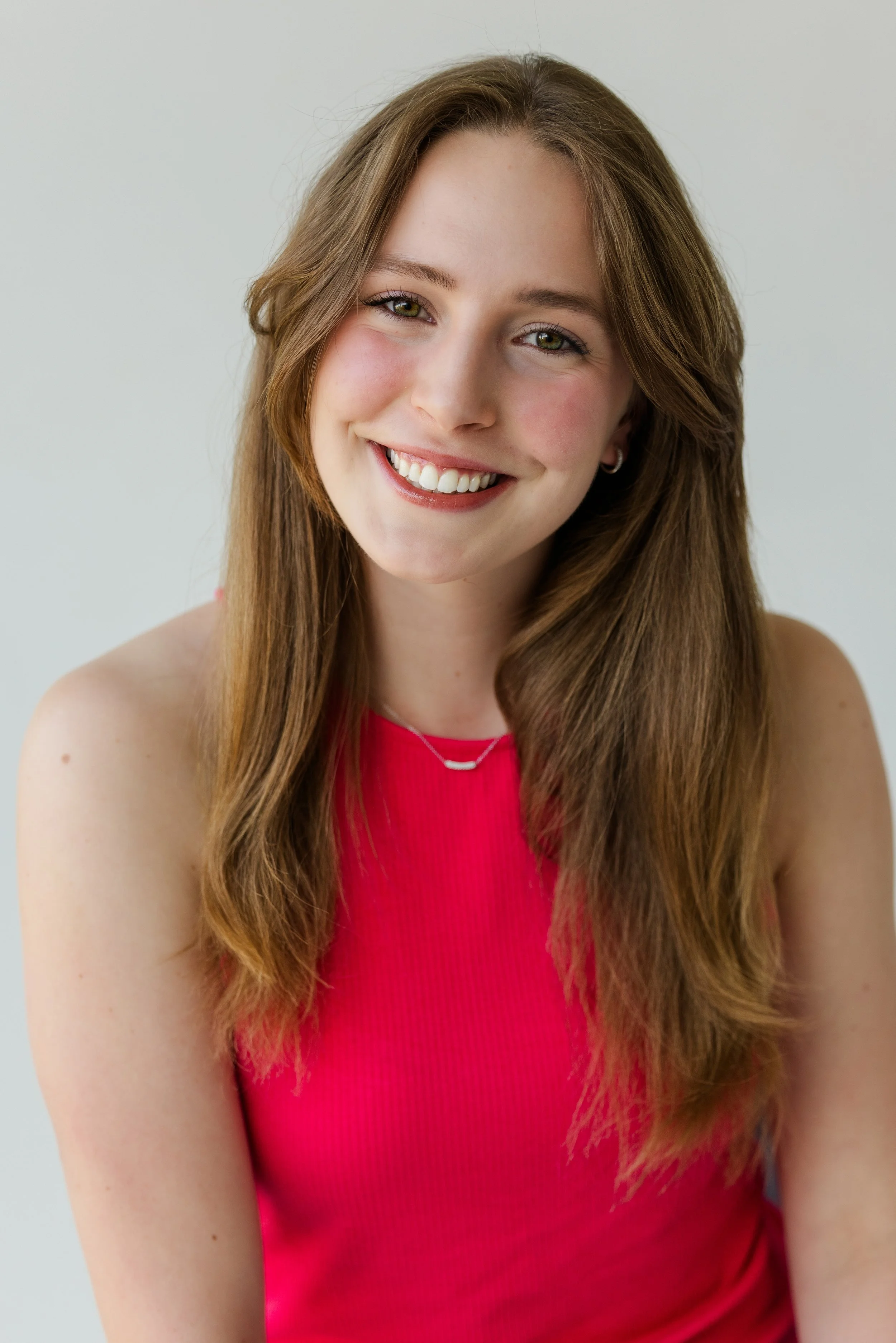 Young woman in red shirt