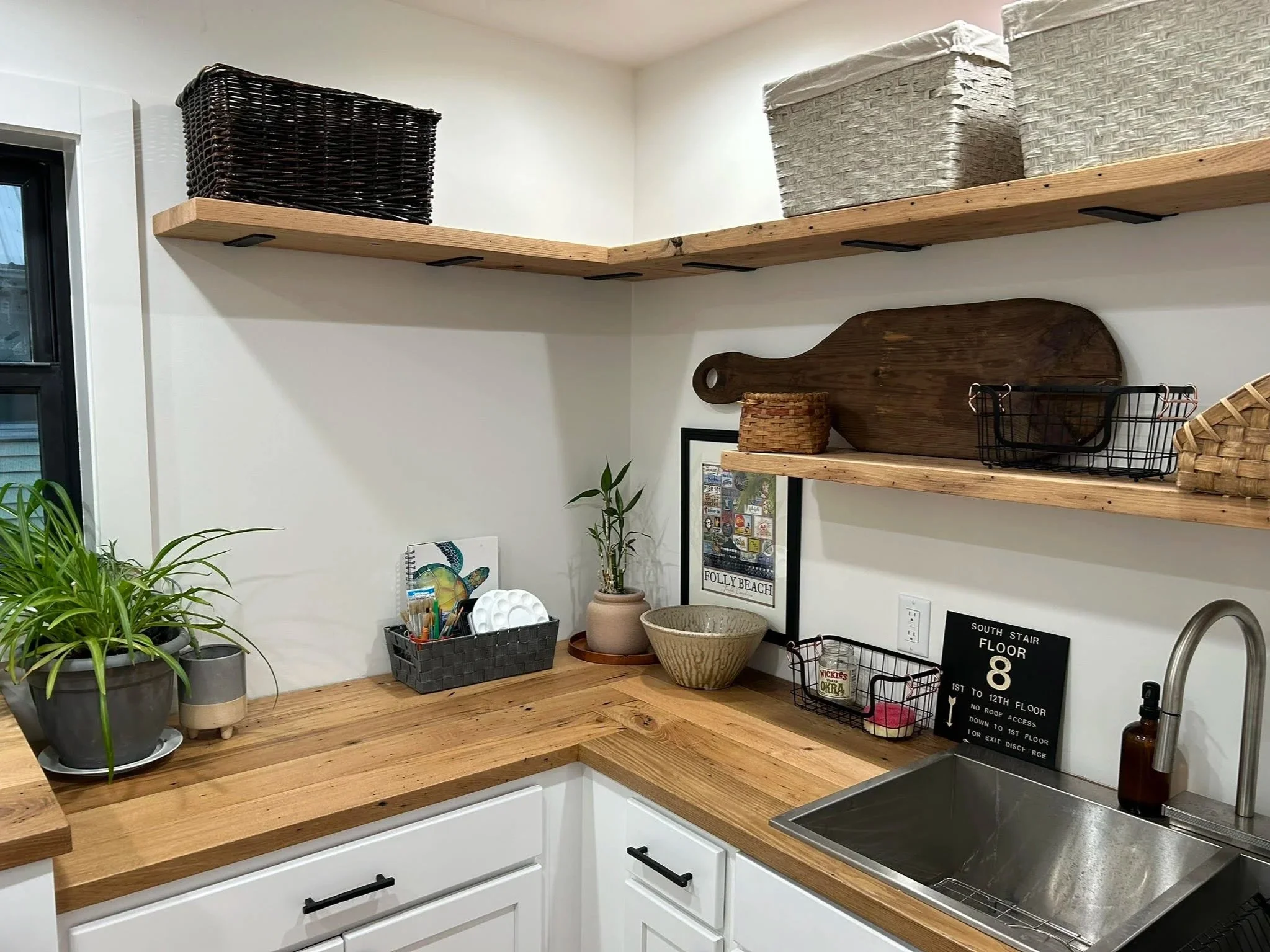 Oranssi technician working on a roof project