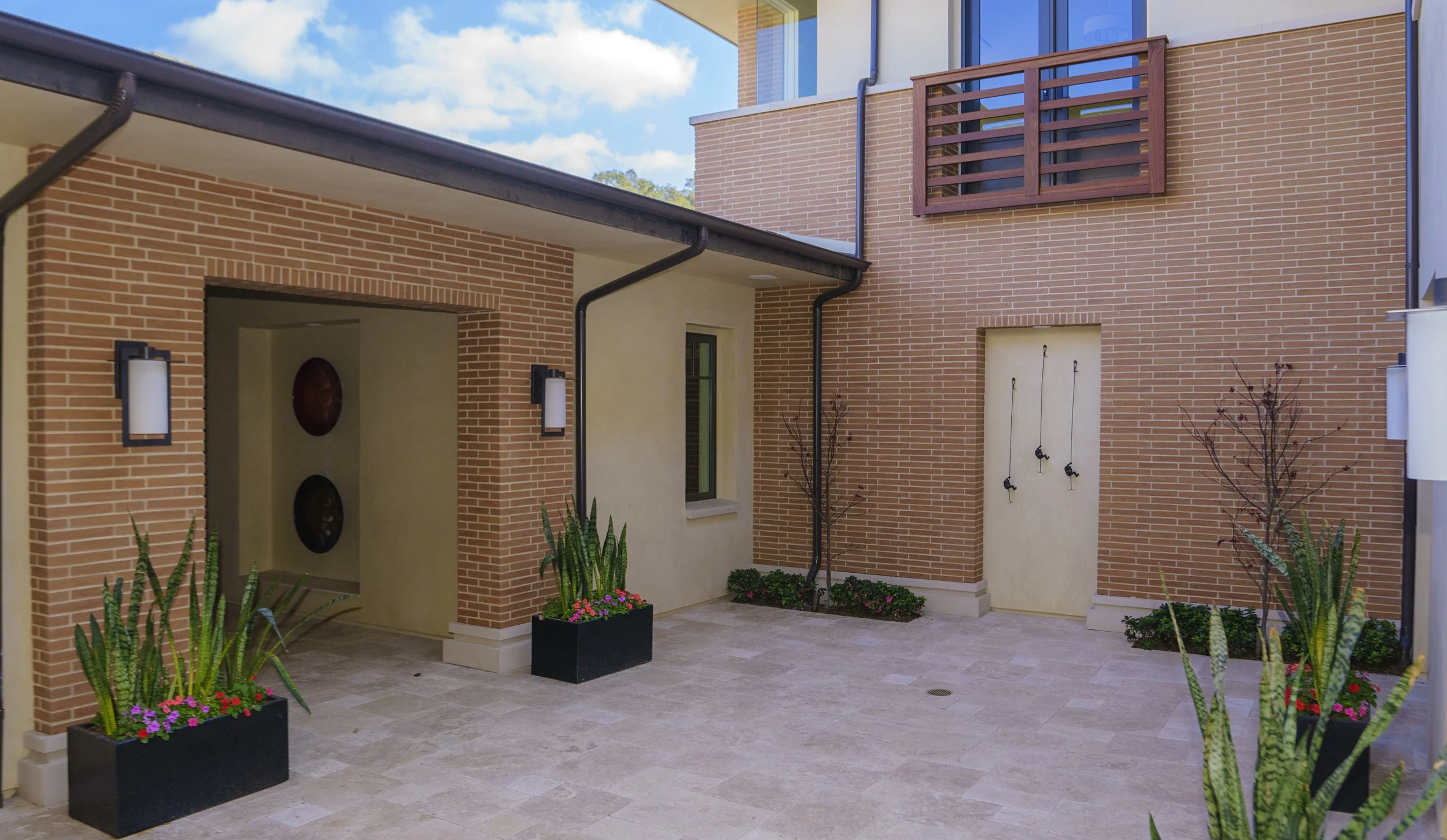 What Really Happens to Sand-Set Porcelain and Travertine Pavers in Orange County