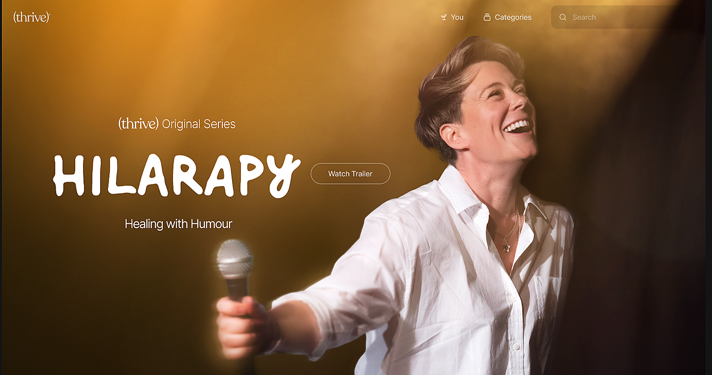 A woman laughing and holding a microphone on stage, with a blurred warm-toned background, promotional content for a series called 'HILARITY' about healing with humor.