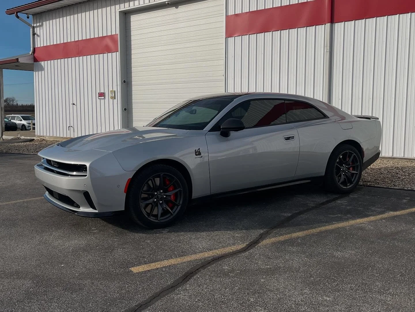 Contact us to get your windows tinted. Here are a couple we took pictures of a few weeks ago. The new Dodge Charger and a Vette!