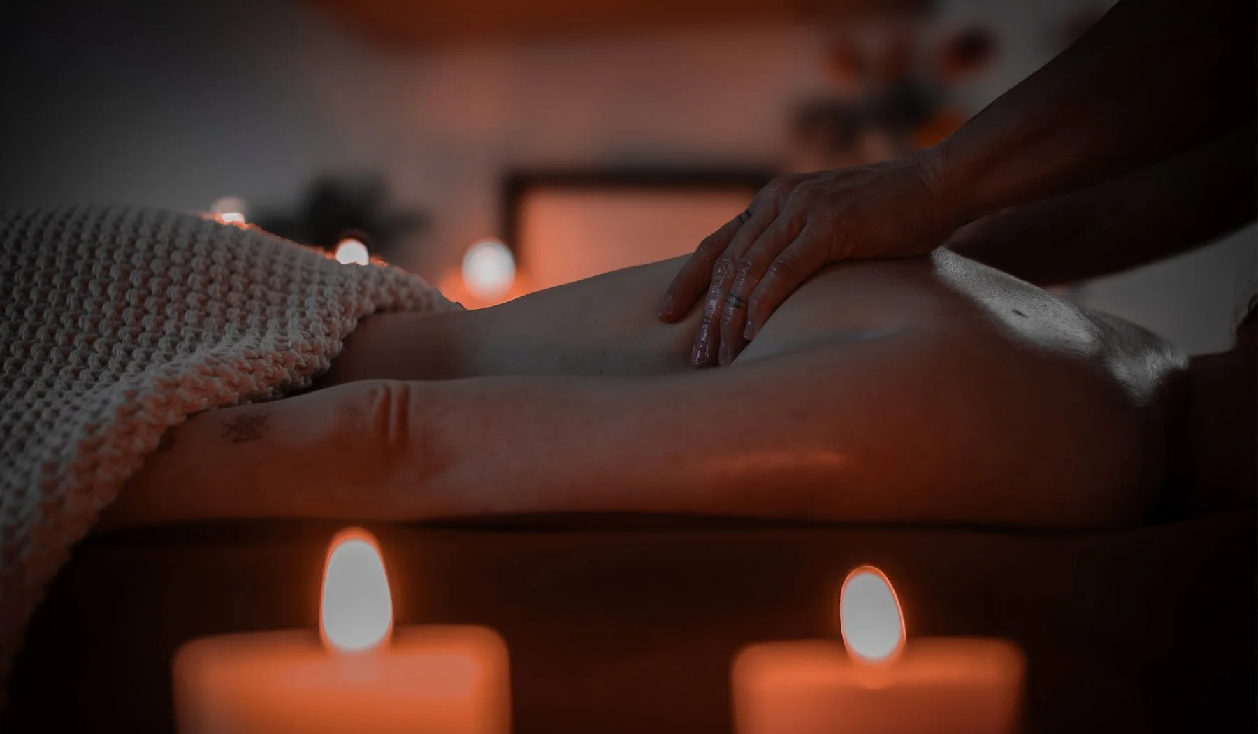 Person receiving a relaxing and therapeutic back massage