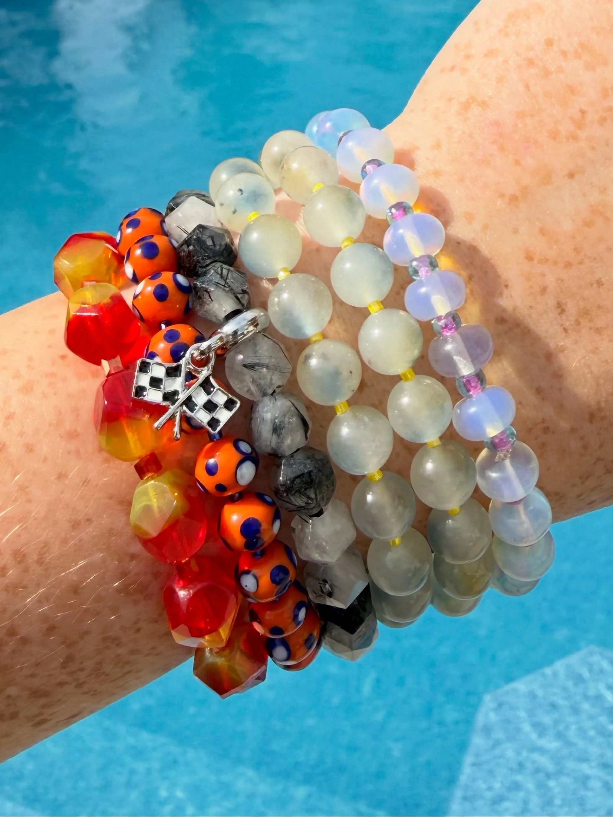 Launching tomorrow: 
Stretch gemstone bracelets inspired by your favorite liveries. Take it from pit lane to poolside and even to other sports. 🏁🏈⚾️
.
.
.
.
#racing #motorsport #gemstonejewelery #bead #sportsaccessories