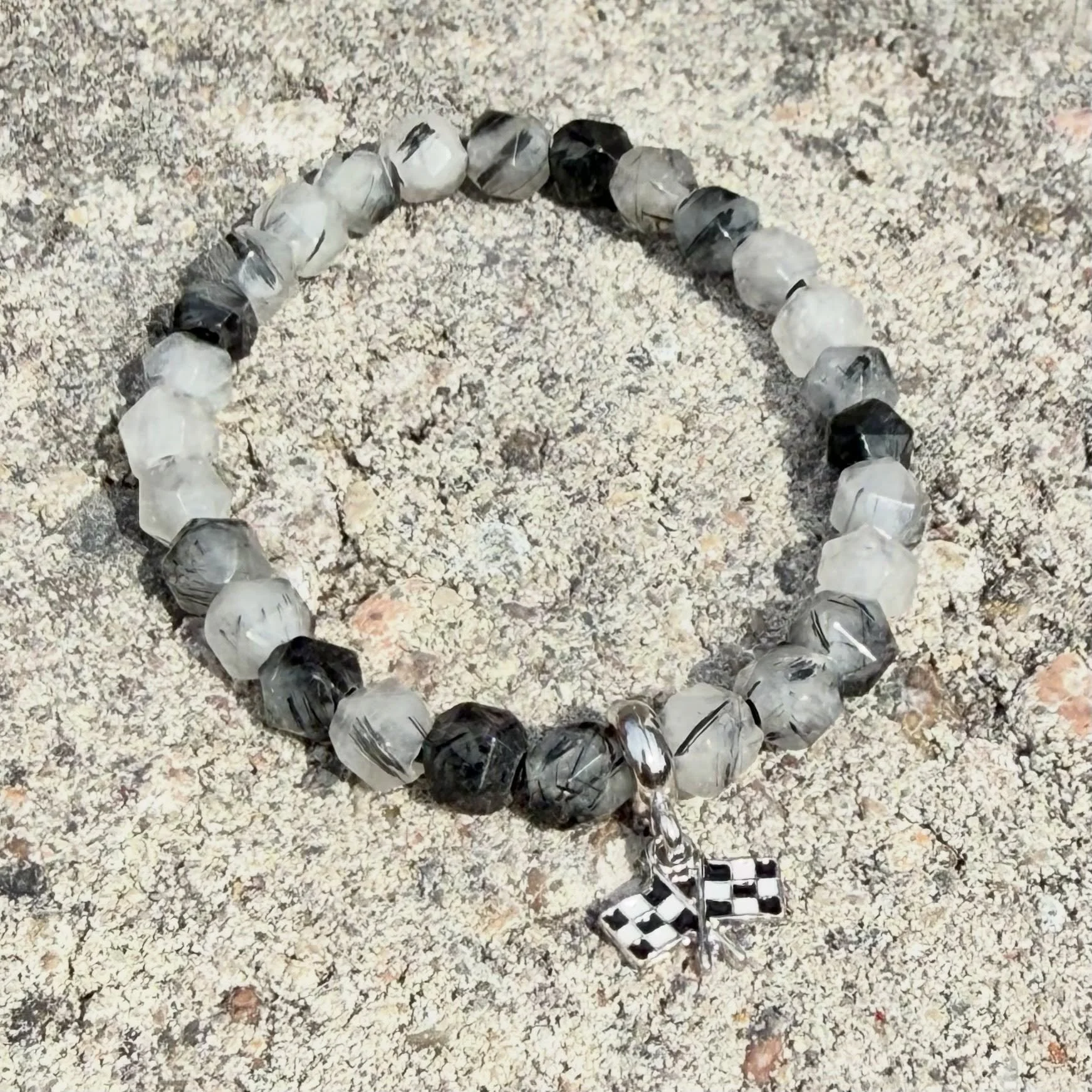 Tourmalinated Quartz is said to purify negative energy and give emotional stability which, let&rsquo;s be honest, you probably need while watching a race. 
 

#racing #motorsport #gemstones racing gifts