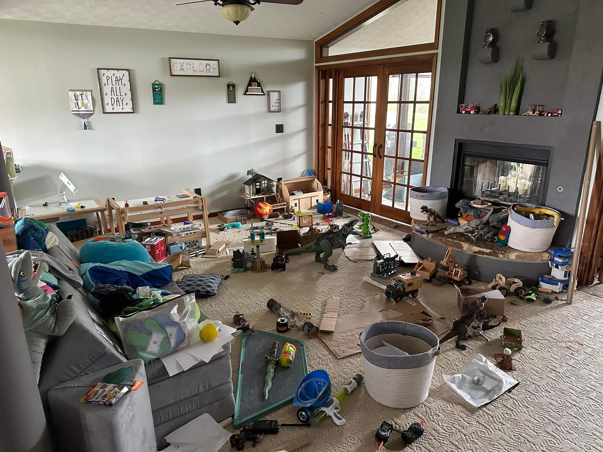 Messy living room full of toys and overwhelm