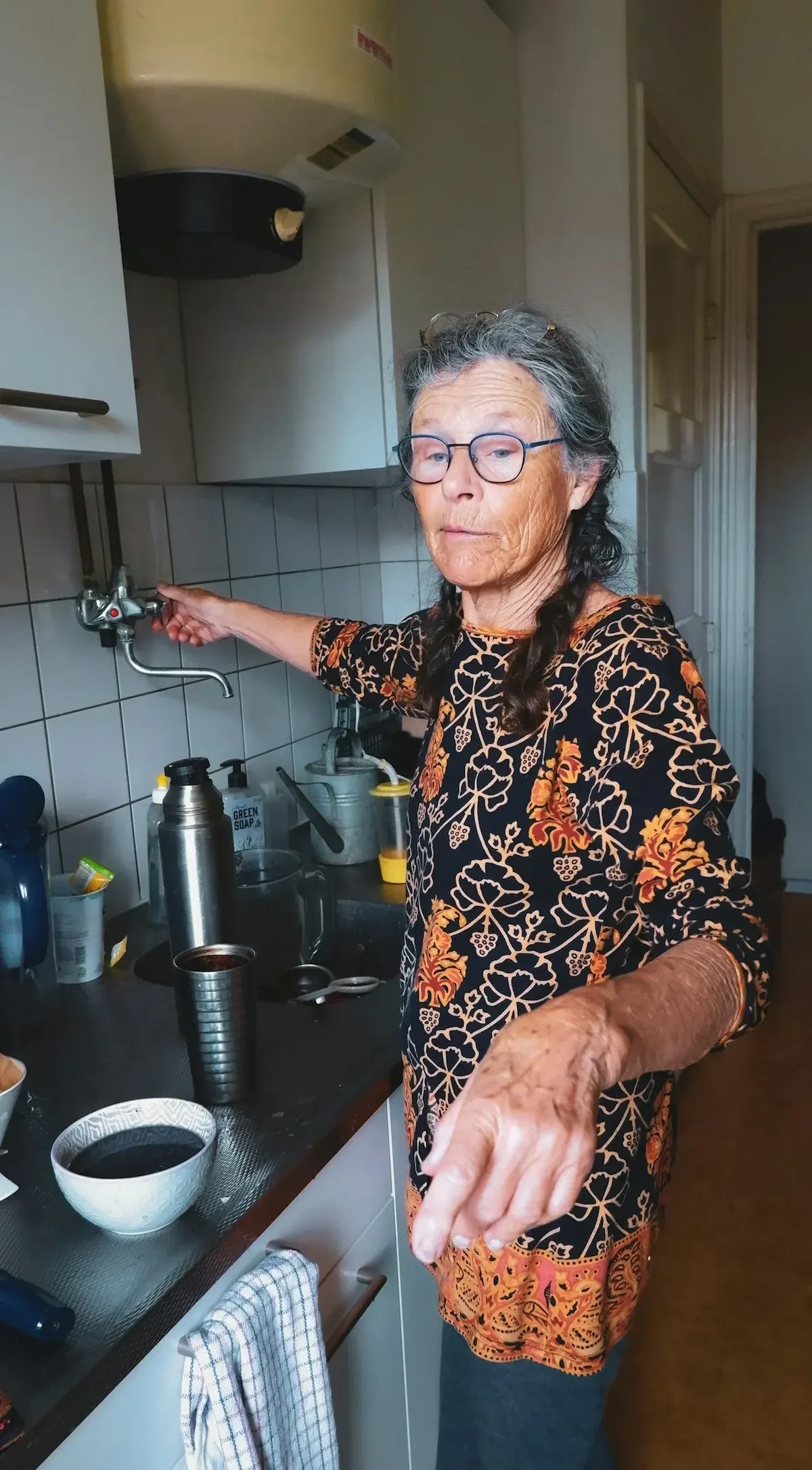 Senior woman organizing her home to age in place safely and comfortably.