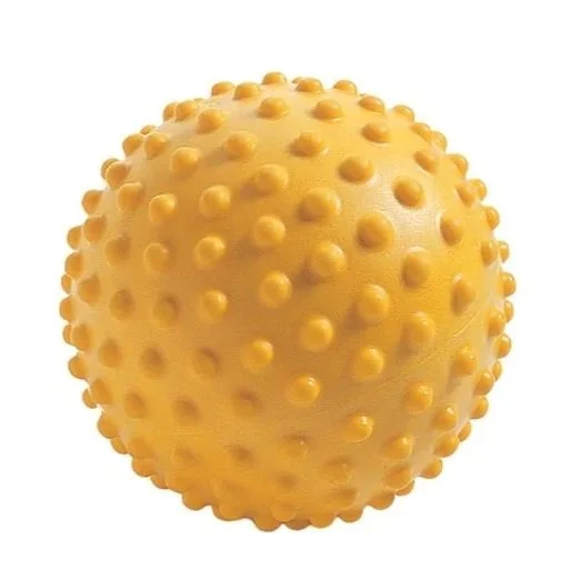 Yellow massage ball with small bumps for muscle relief.