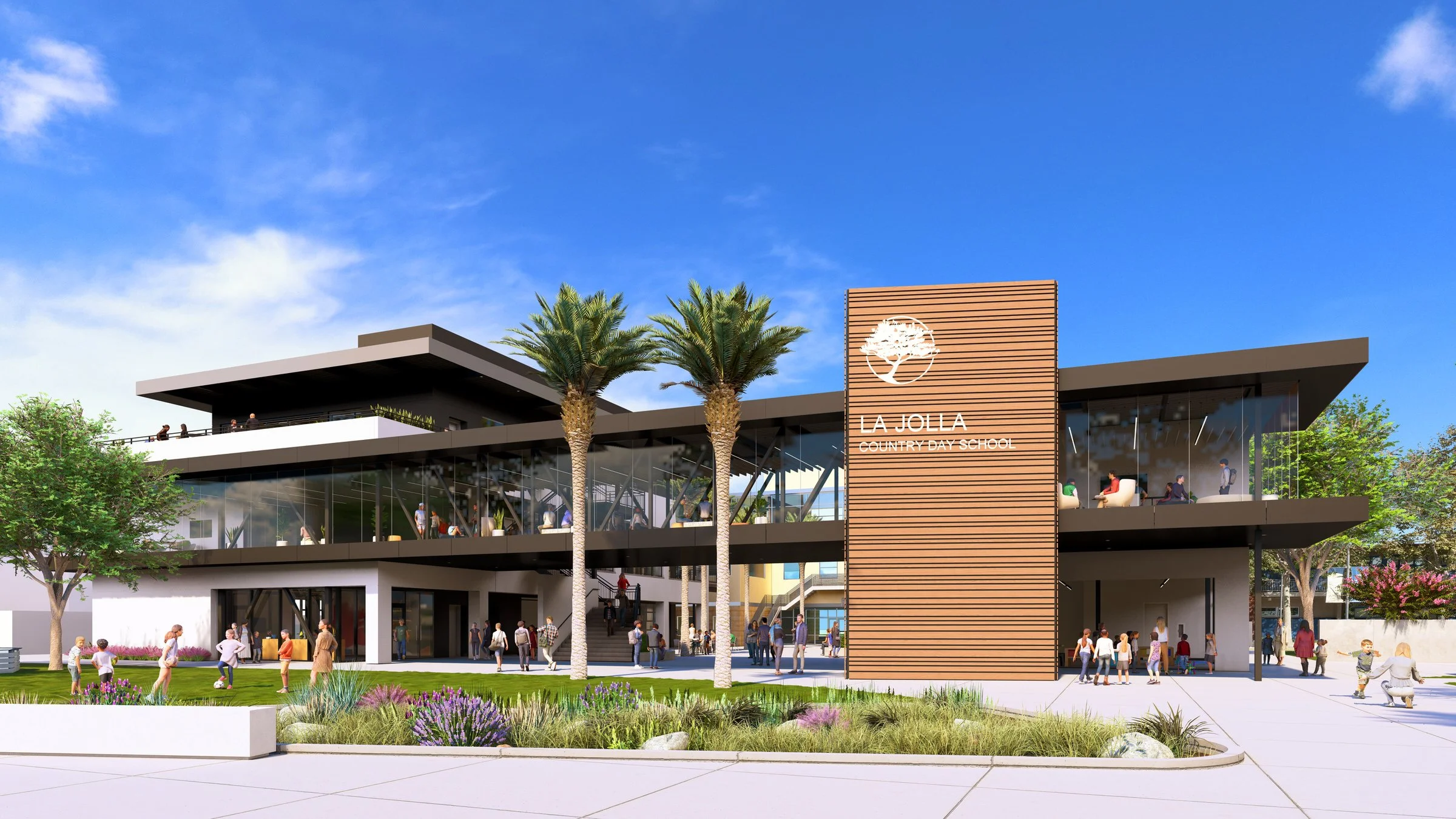 Modern school building with glass walls, palm trees, and students outside on a sunny day.