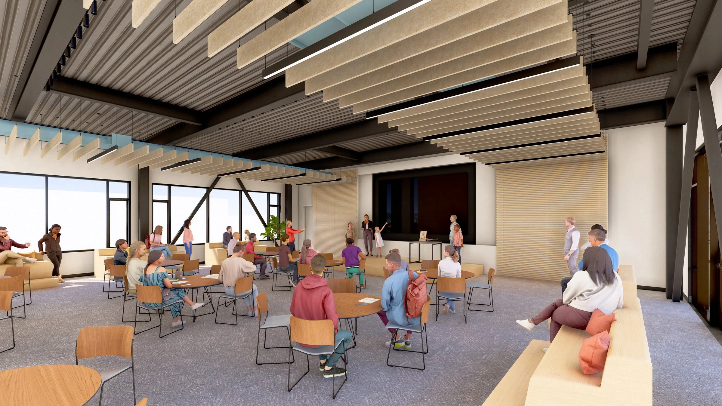 Modern multi-purpose room with people seated at tables, large windows, slatted ceiling, and a stage area.