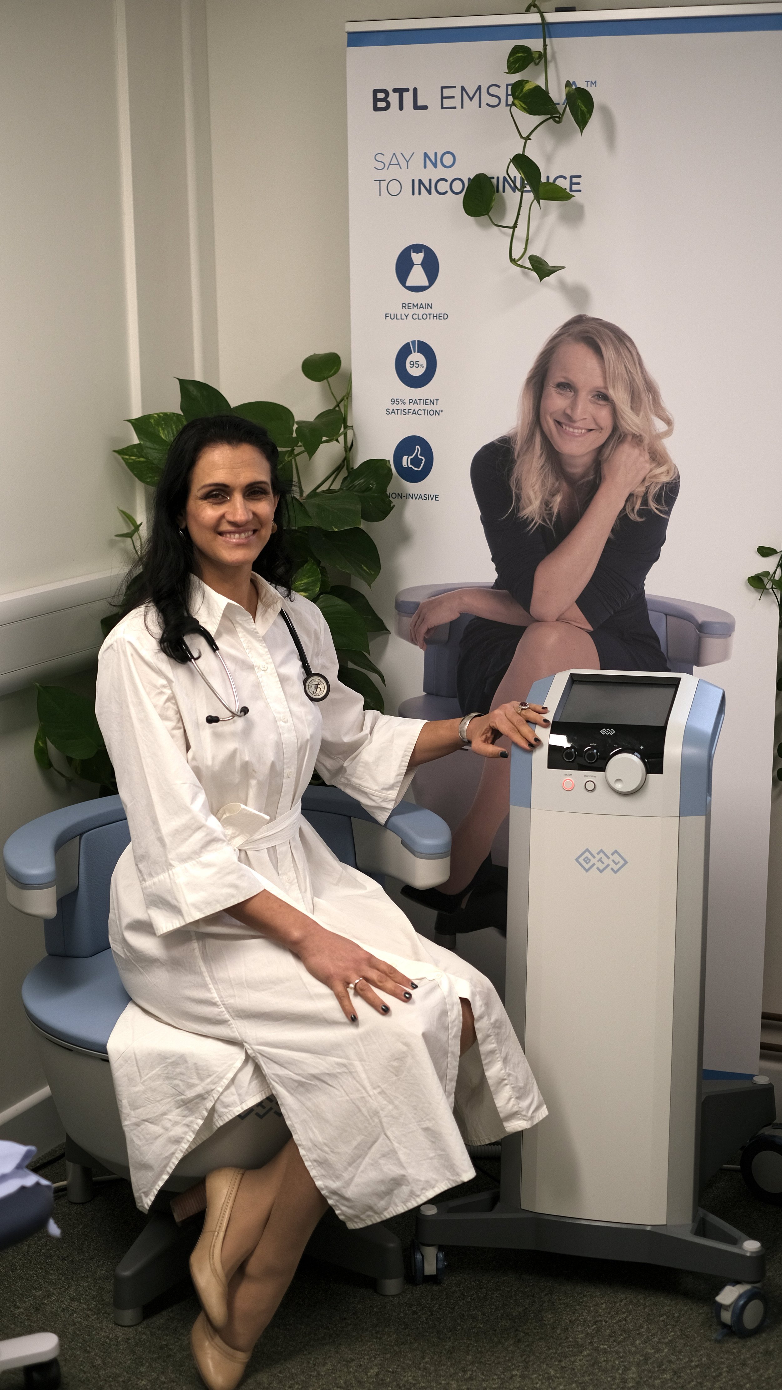 Dr Margarita Sitting on Emsella chair