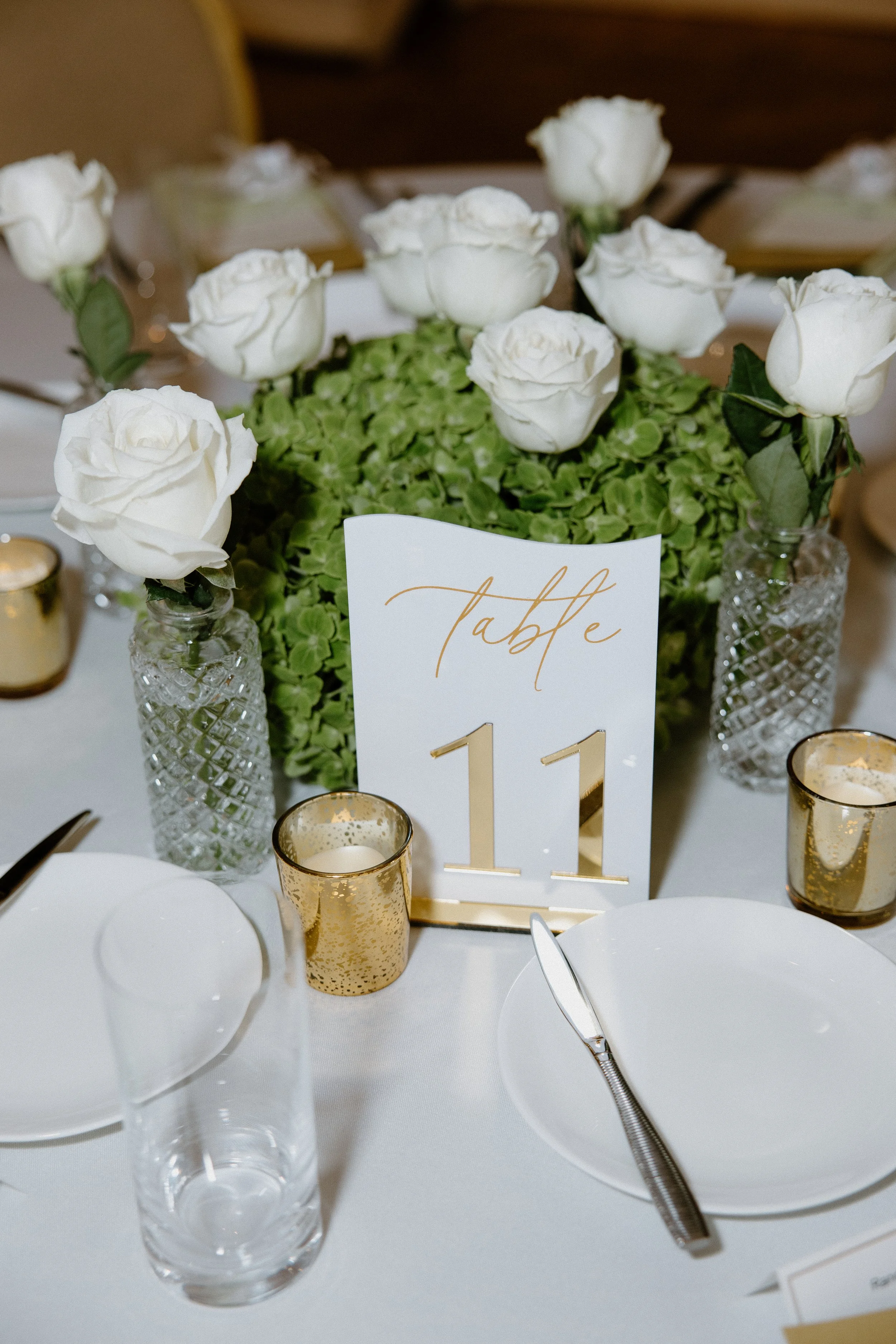 Floral centerpiece with table number