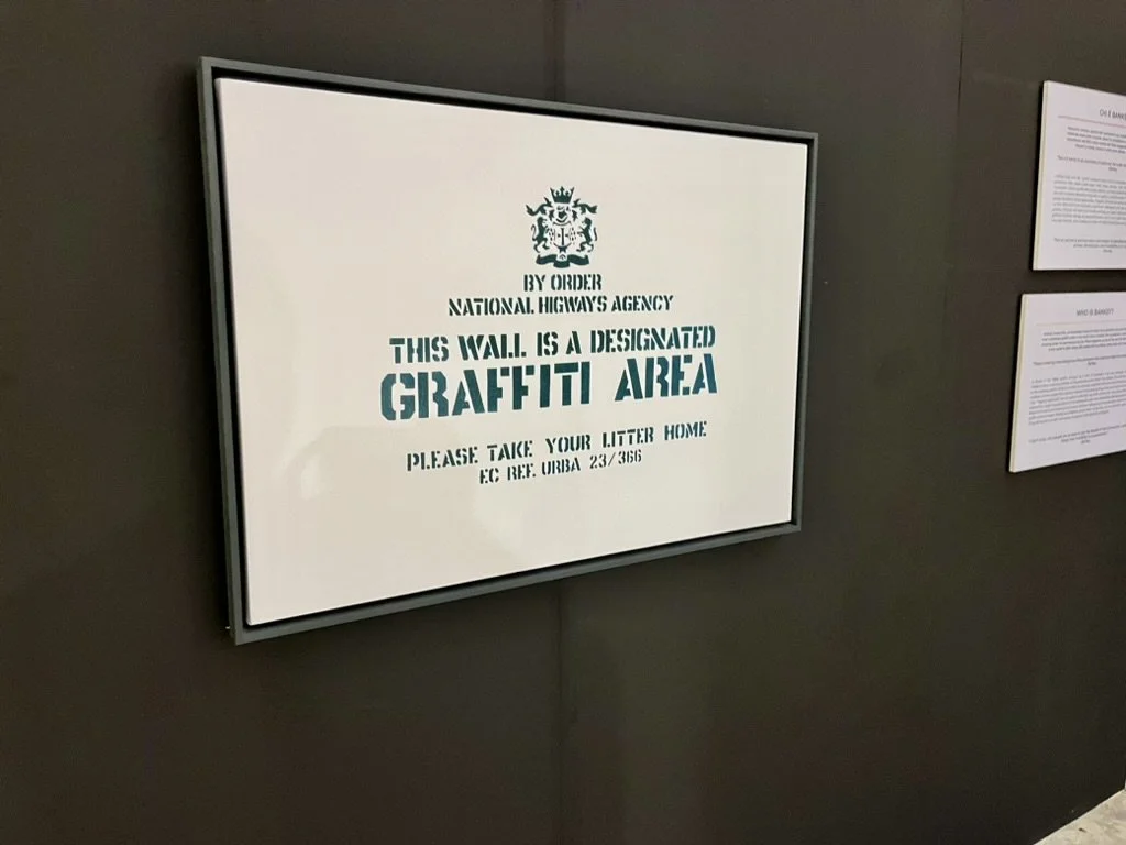We stumbled upon a pop up Banksy exhibit in the Genova train station, "The World of Banksy - The Immersive Experience"