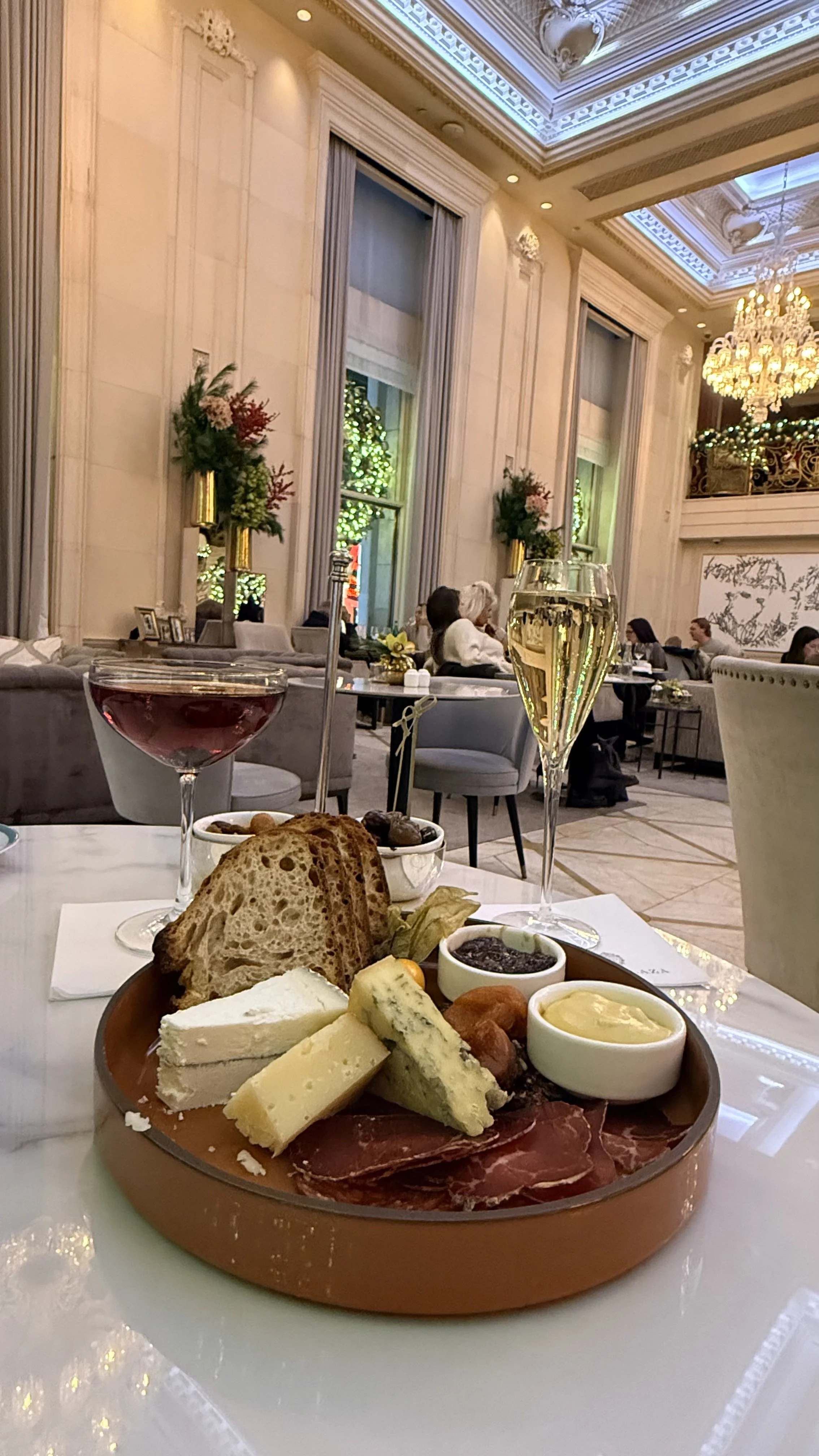 Champagne and charcuterie at the Plaza Hotel Champagne Room in New York City