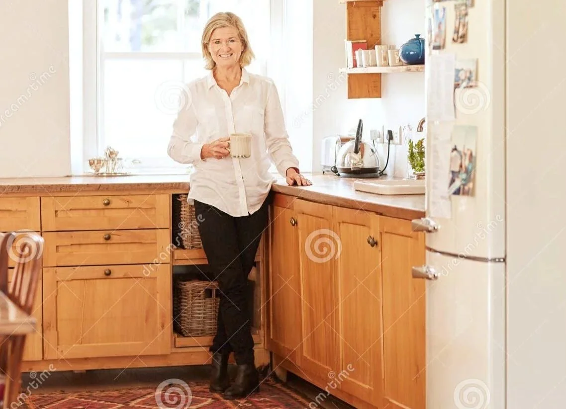 Confident older woman has lost weight on GLP! and appears happy.