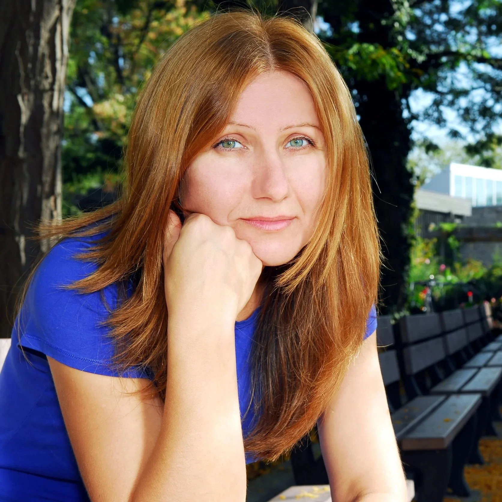 Portrait of exhausted woman with long red hair