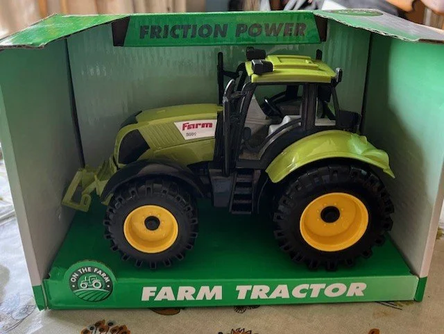 On the farm green friction tractor.jpg