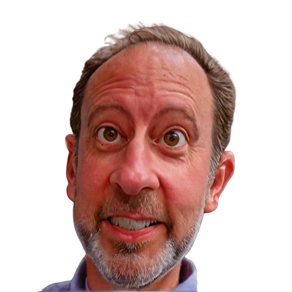 Close-up of a middle-aged man with a surprised expression, raised eyebrows, wide-open eyes, slightly grimaced mouth, gray beard, and short gray hair, wearing a collared shirt.