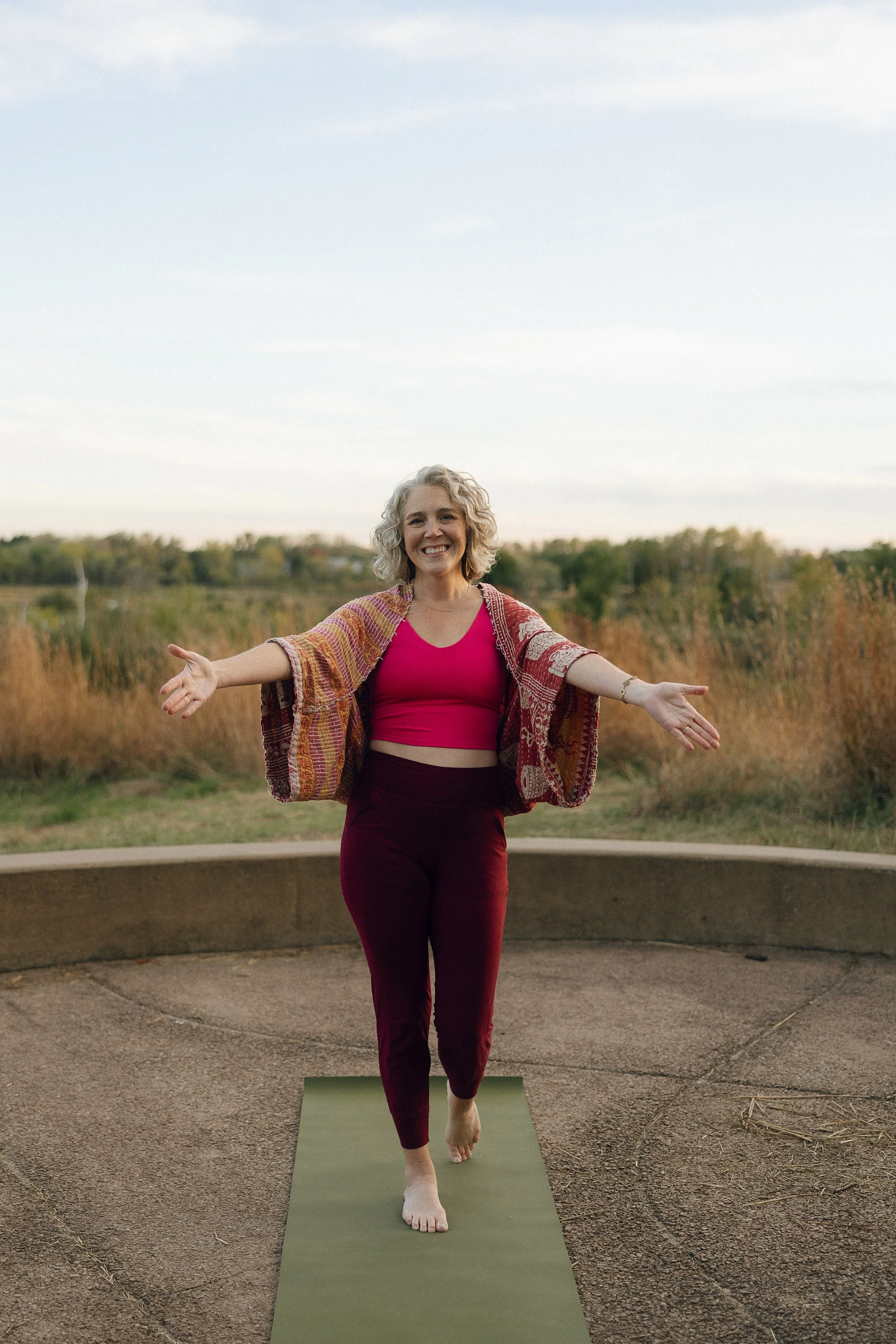 Sarah doing yoga at the park