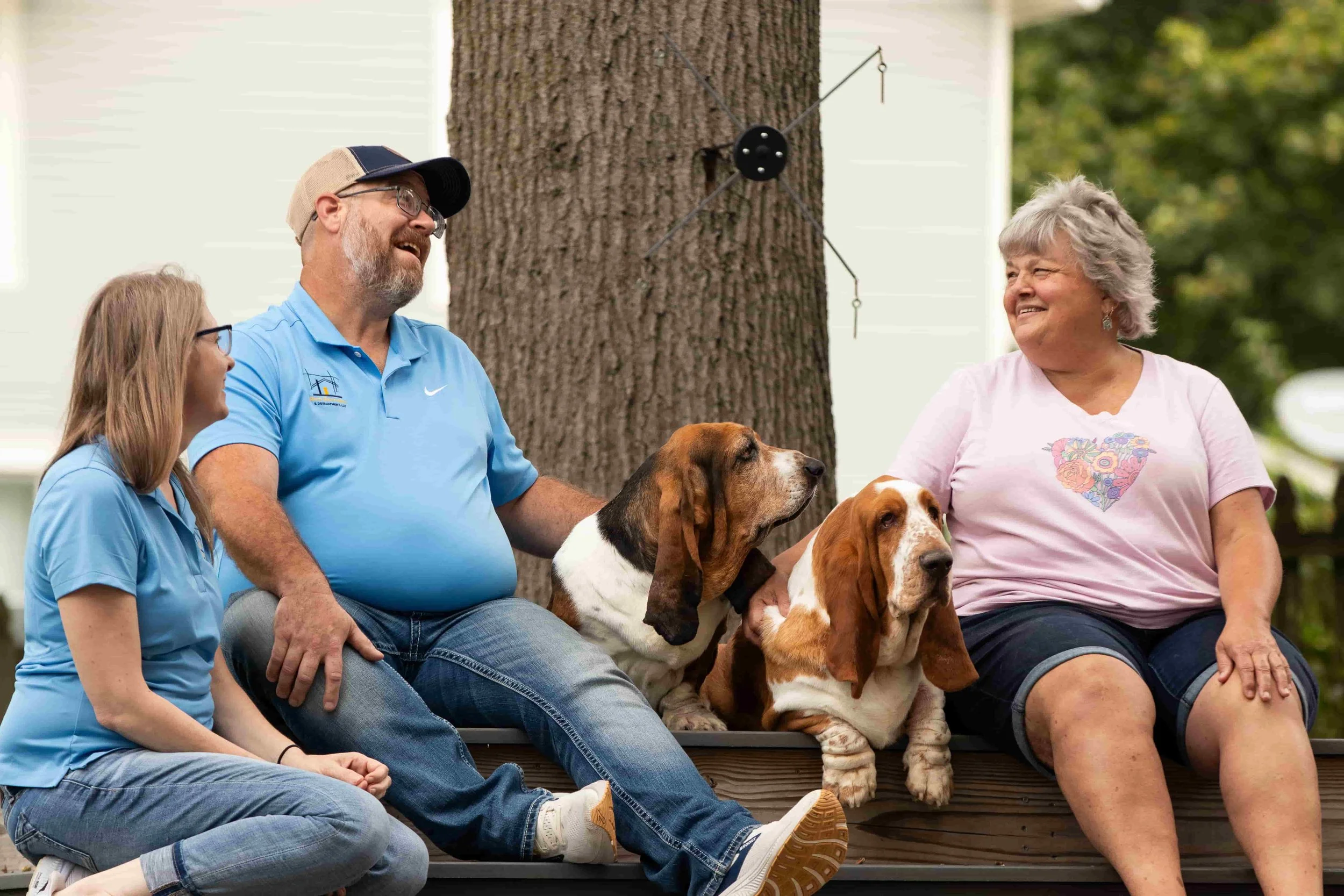 Rural Renovation Team with Joni and Her Basset Hounds