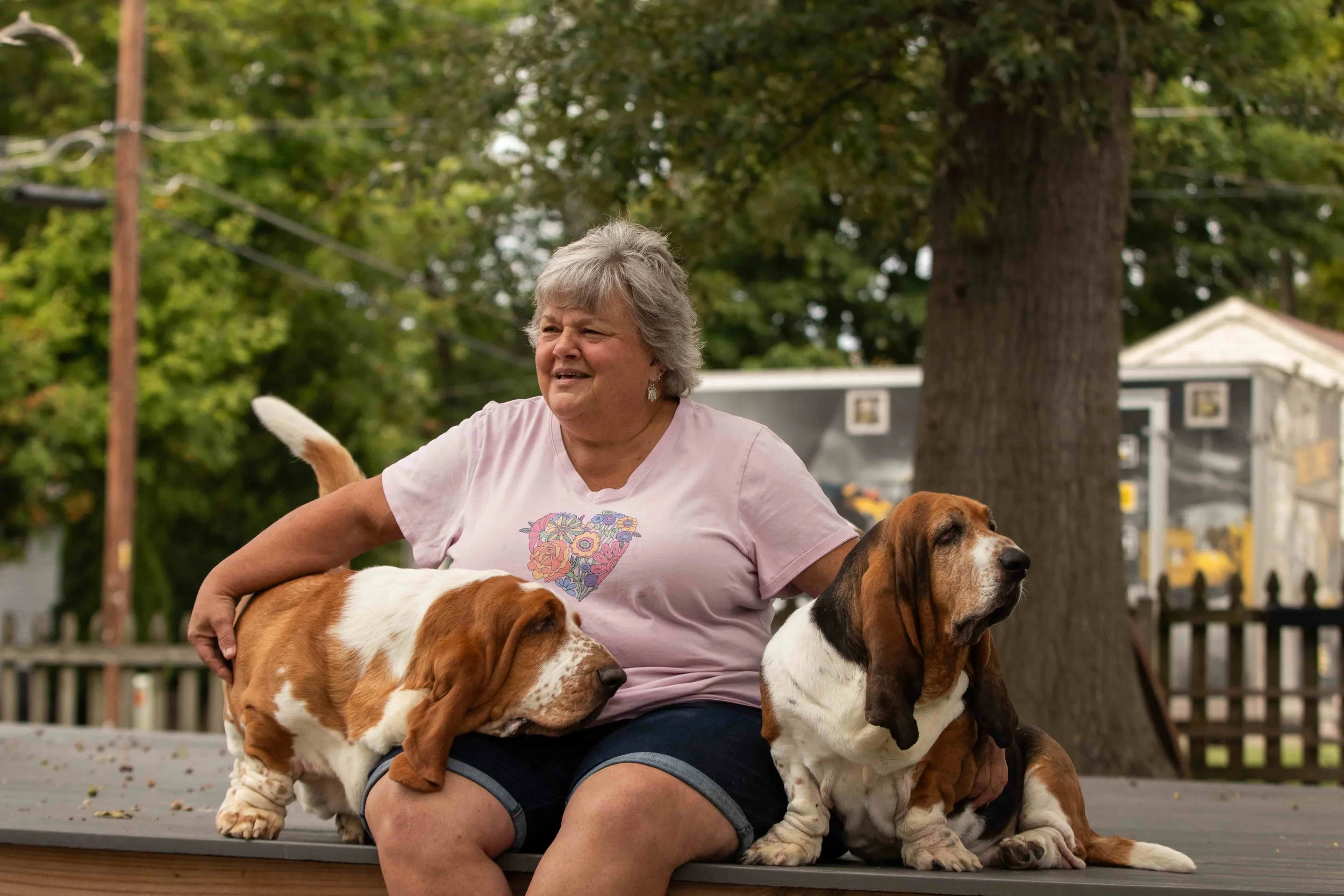 Happy Client and Her Dogs After the Remodel