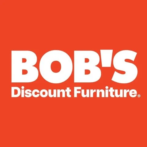 Red background with white text that reads "BOB'S Discount Furniture"
