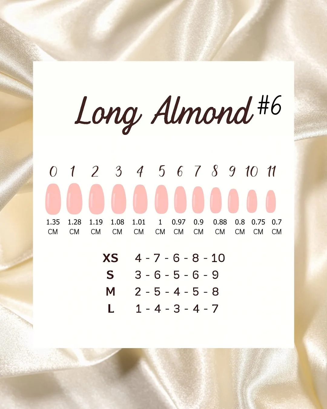 A chart showing different shades of Long Almond nail shapes and sizes with their respective measurements in centimeters and their corresponding sizes from XS to L. The background is satin fabric.