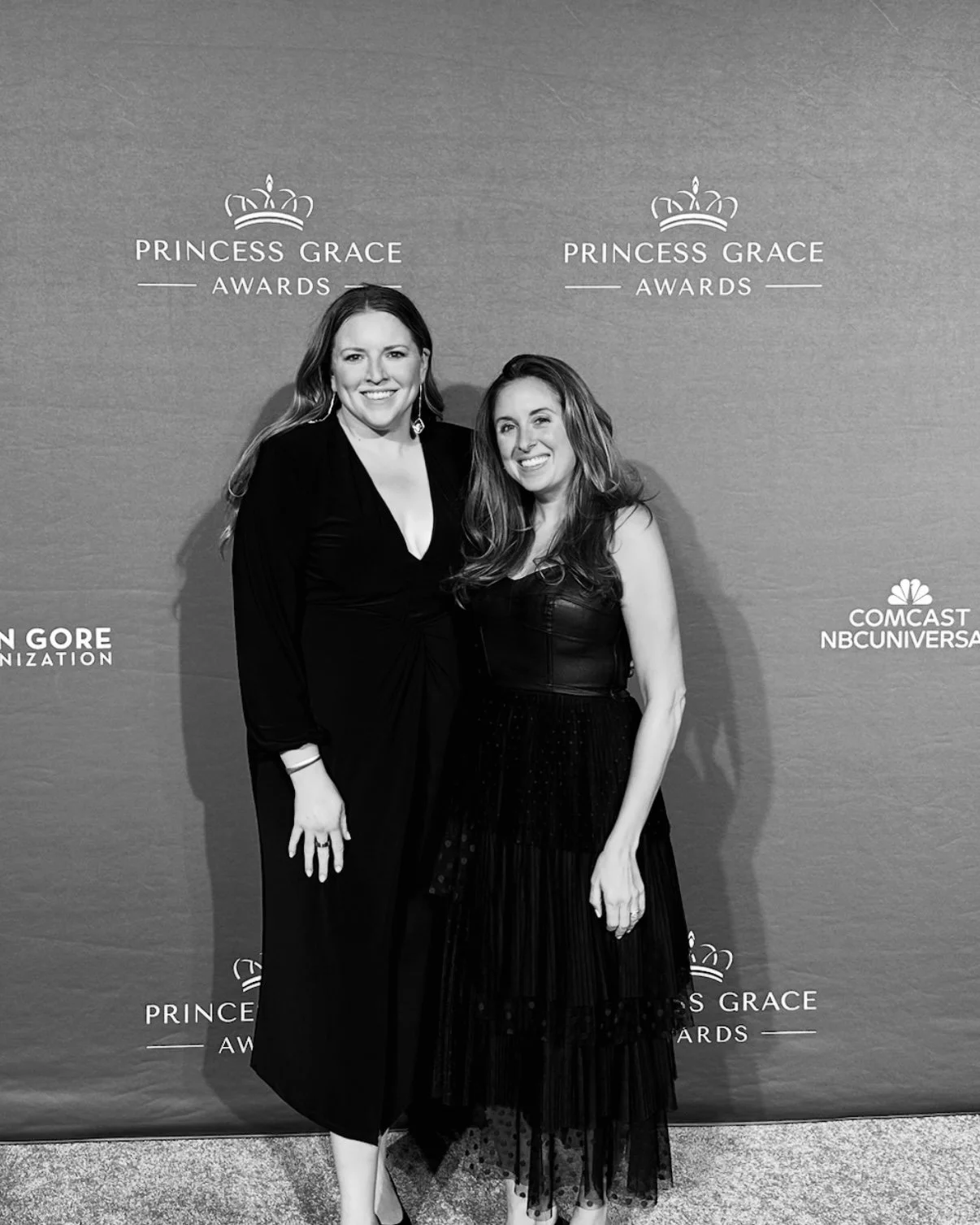 Erin Eastburn attending the Princess Grace Awards with a colleague at a red carpet industry event