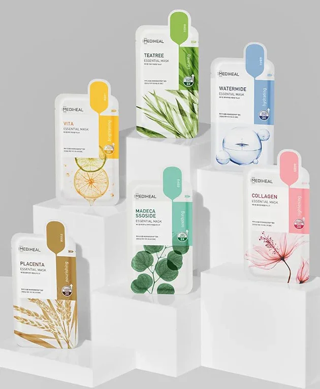 Collection of different skincare mask packages, each with a unique design and color scheme, displayed on white pedestals.