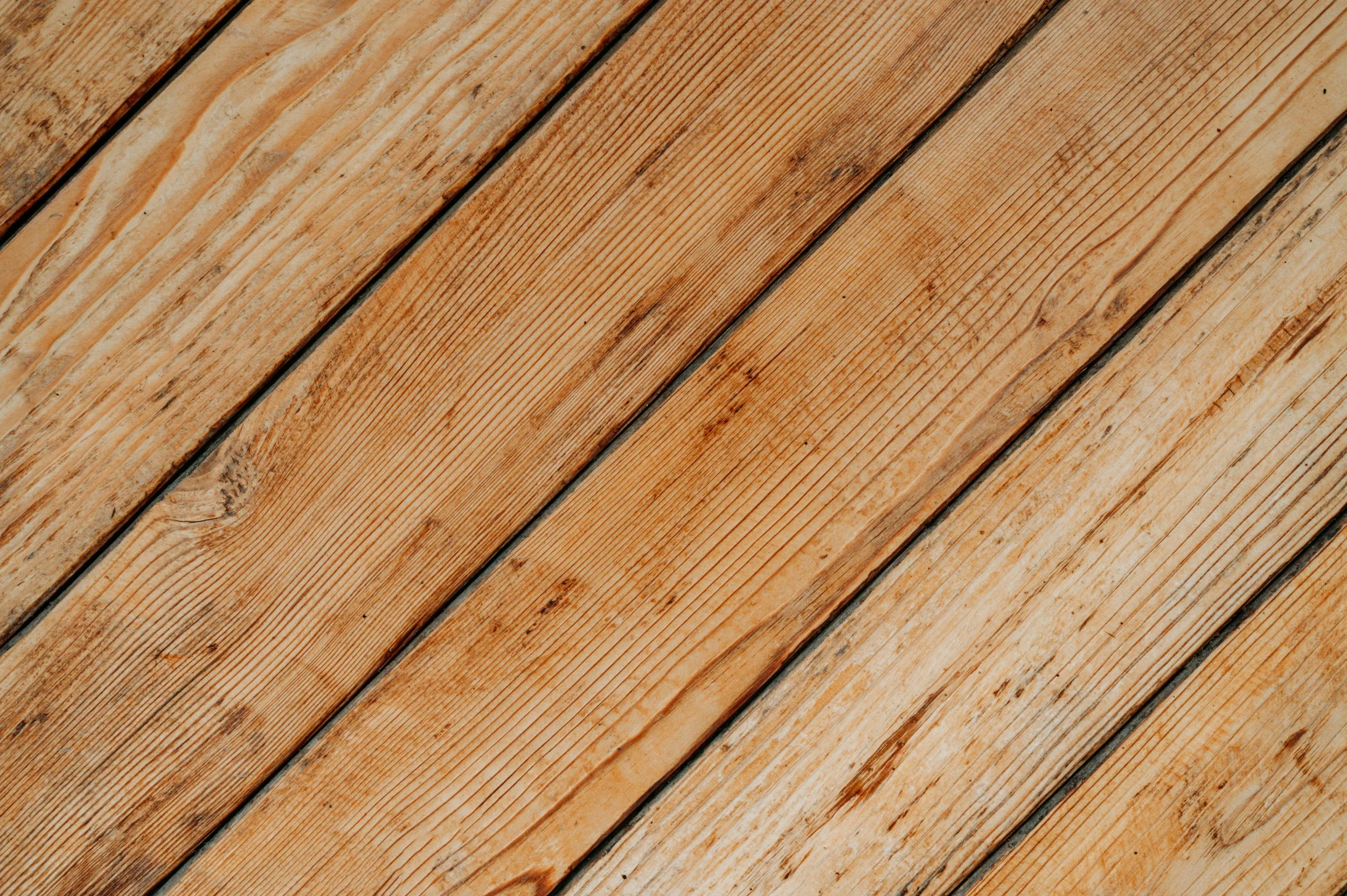 Close-up of diagonal wooden planks showing natural grain and texture.