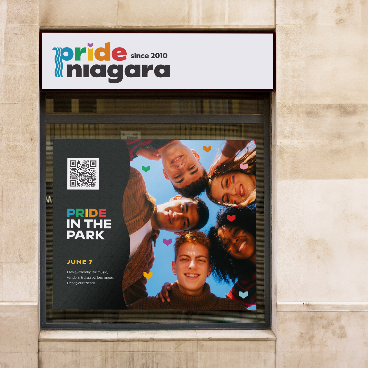Window graphic design display showcasing Pride Niagara concept work by Steph Parker Designs