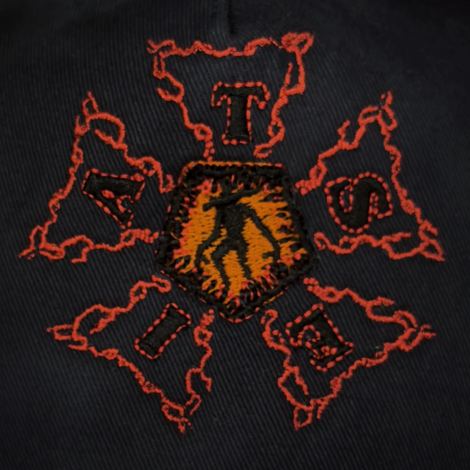 Embroidered patch with a bear head outline and a central shield, surrounded by the words 'BAD' and 'DAYS' in red on black fabric.