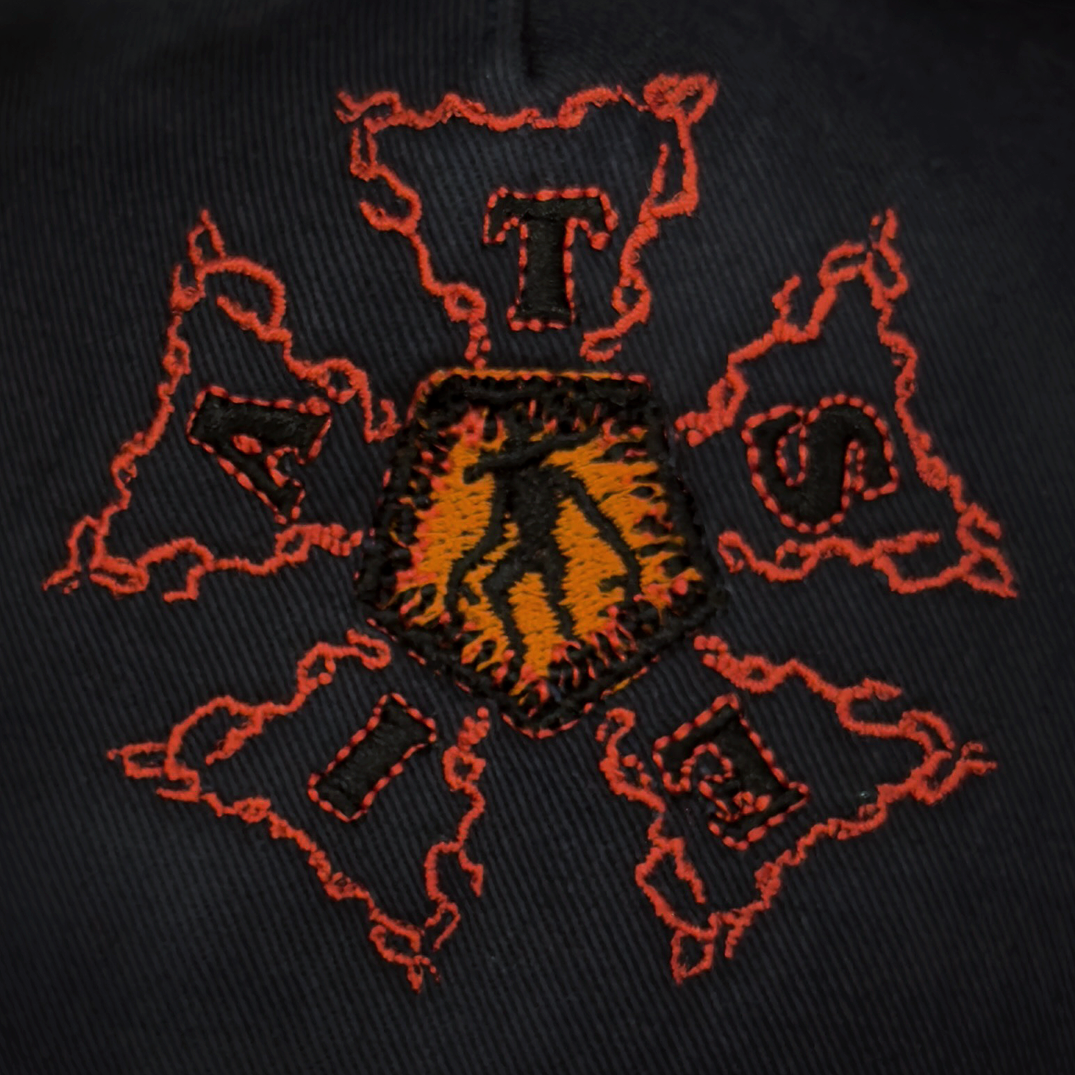 Embroidered patch with a bear head outline and a central shield, surrounded by the words 'BAD' and 'DAYS' in red on black fabric.