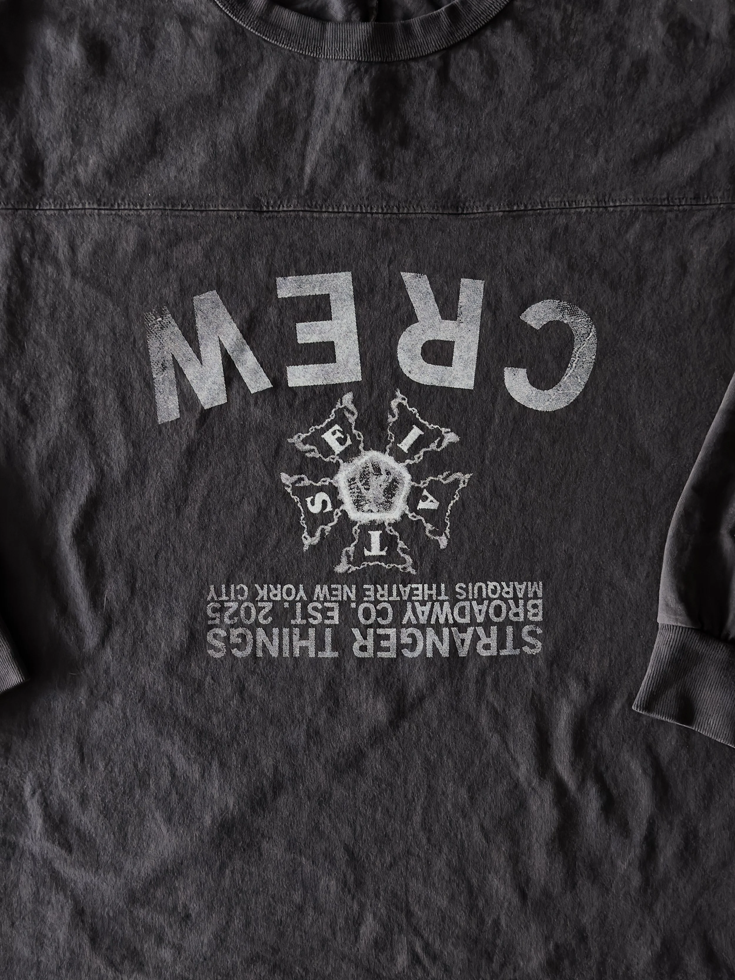 Black firefighter sweatshirt with gray text and emblem reading 'StrangerThings' and 'Br-based Marine's Texas' with a fire emblem and the year 2025.