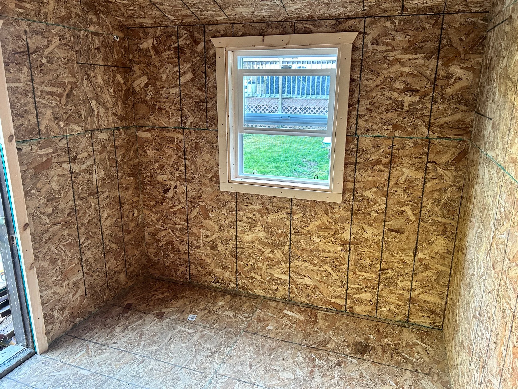 Shed sheeted inside with new window