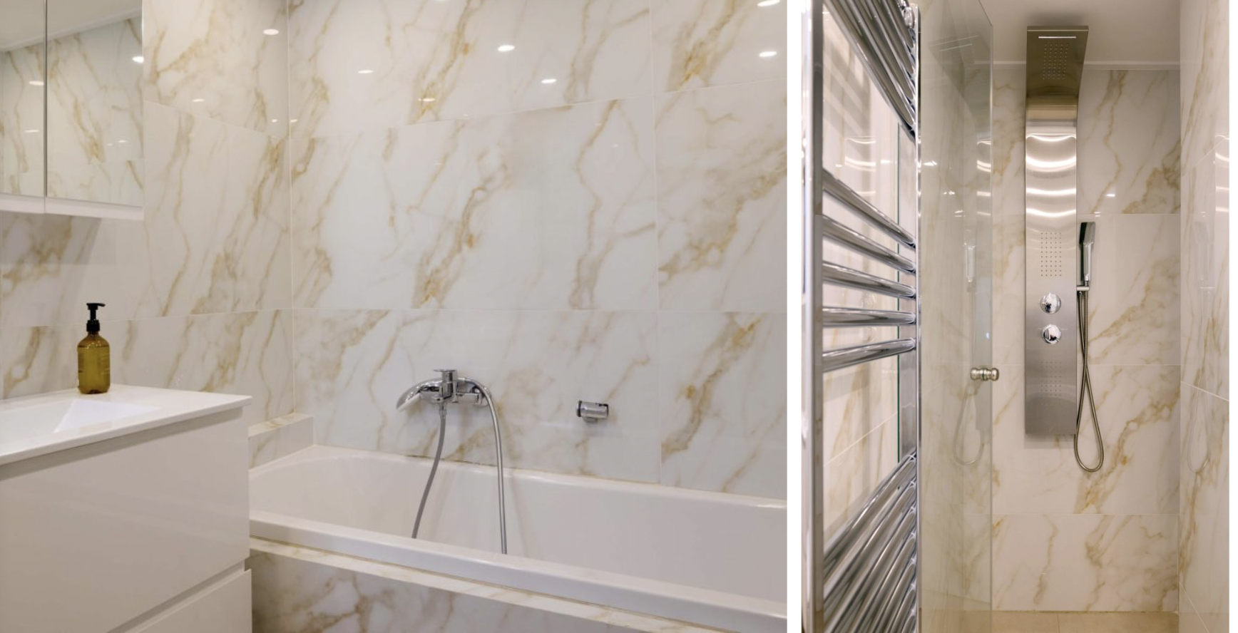 A modern bathroom with marble walls, a built-in bathtub with a faucet and handheld shower, a small countertop with a soap dispenser, a heated towel rack, and a separate glass-enclosed shower with a rain showerhead and a handheld shower.